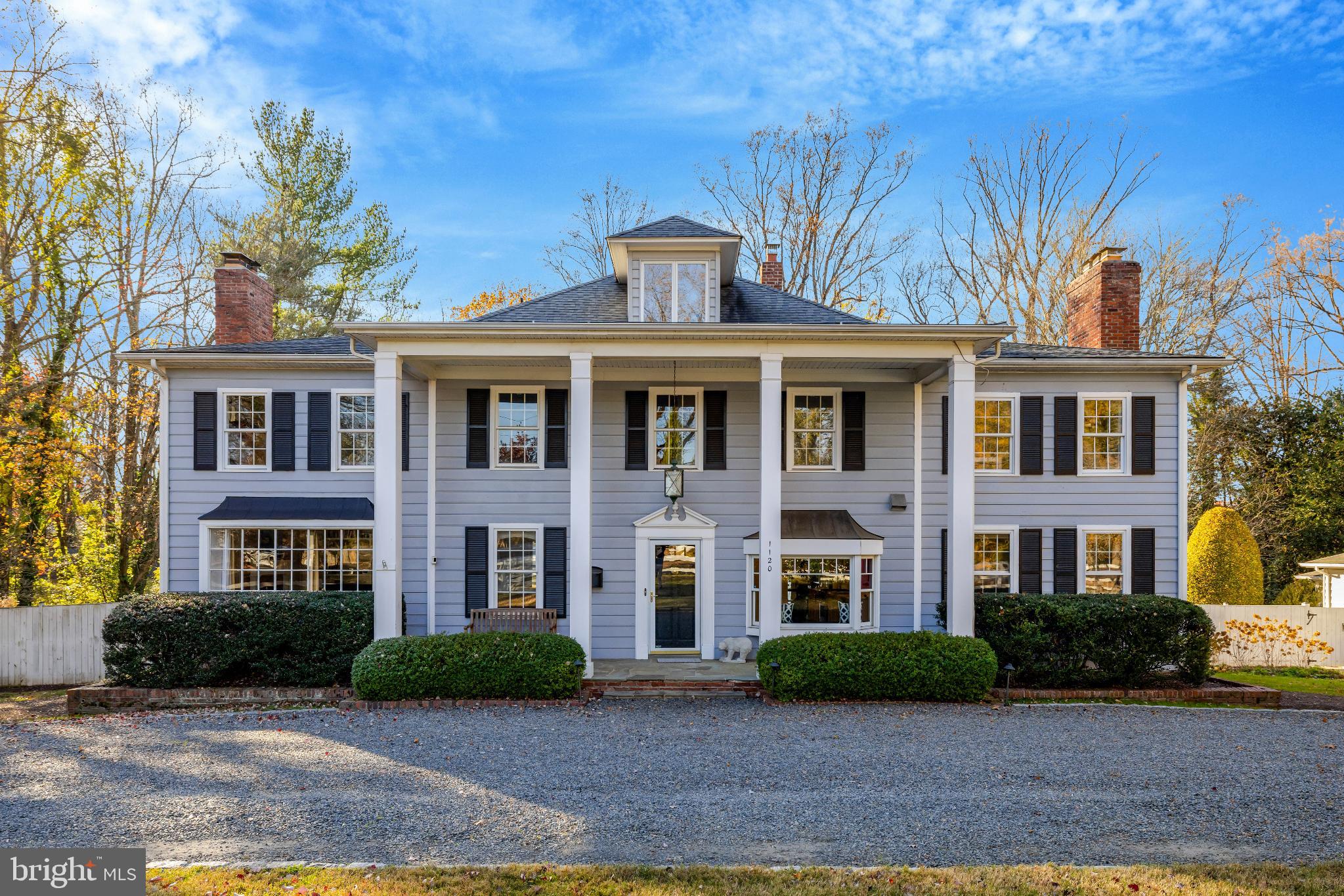 A beautifully renovated 1905 farmhouse with timeless character and exceptional modern upgrades, set on an extraordinary 1.7 acre lot - a true rarity in McLean. Located in the coveted Langley High School pyramid, and minutes to major commuter routes, Tysons Corner, and downtown McLean with a wide range of restaurant, shopping, and entertainment options. This 5 bedroom/ 5 bath (3 full / 2 half) home blends original architectural features—including beamed ceilings—with extensive modern improvements throughout. The main level features new hardwood floors, a fully renovated gourmet kitchen, an updated family room, and an incredible screened porch with Ipe flooring.

Upstairs, a renovated primary suite with upgraded bath, a fully remodeled hall bath, and four additional bedrooms provide generous space for family, guests, or a home office. A fully finished loft adds flexible bonus space serving as an additional bedroom, office, or playroom. The lower unfinished utility room includes a conditioned storage area with a vapor barrier and dehumidification system.

The truly expansive tree-lined backyard features a heated inground pool, koi pond, outdoor fireplace, extensive hardscaping and landscaping and PLENTY of room for entertaining and backyard games. The detached 2-car garage was renovated in 2022 and includes a conditioned bonus room ideal for an exercise room or golf simulator. The curved driveway provides parking for 8+ vehicles. Notable features and updates include an oversized Generac 38kW whole-home generator, upgraded electrical panels, new pool filter/pump and perimeter waterline tile, and extensive hardscaping/landscaping by Wheat’s. 

This is a rare opportunity to own a fully modernized historic home with extraordinary outdoor space in one of McLean’s most desirable locations.