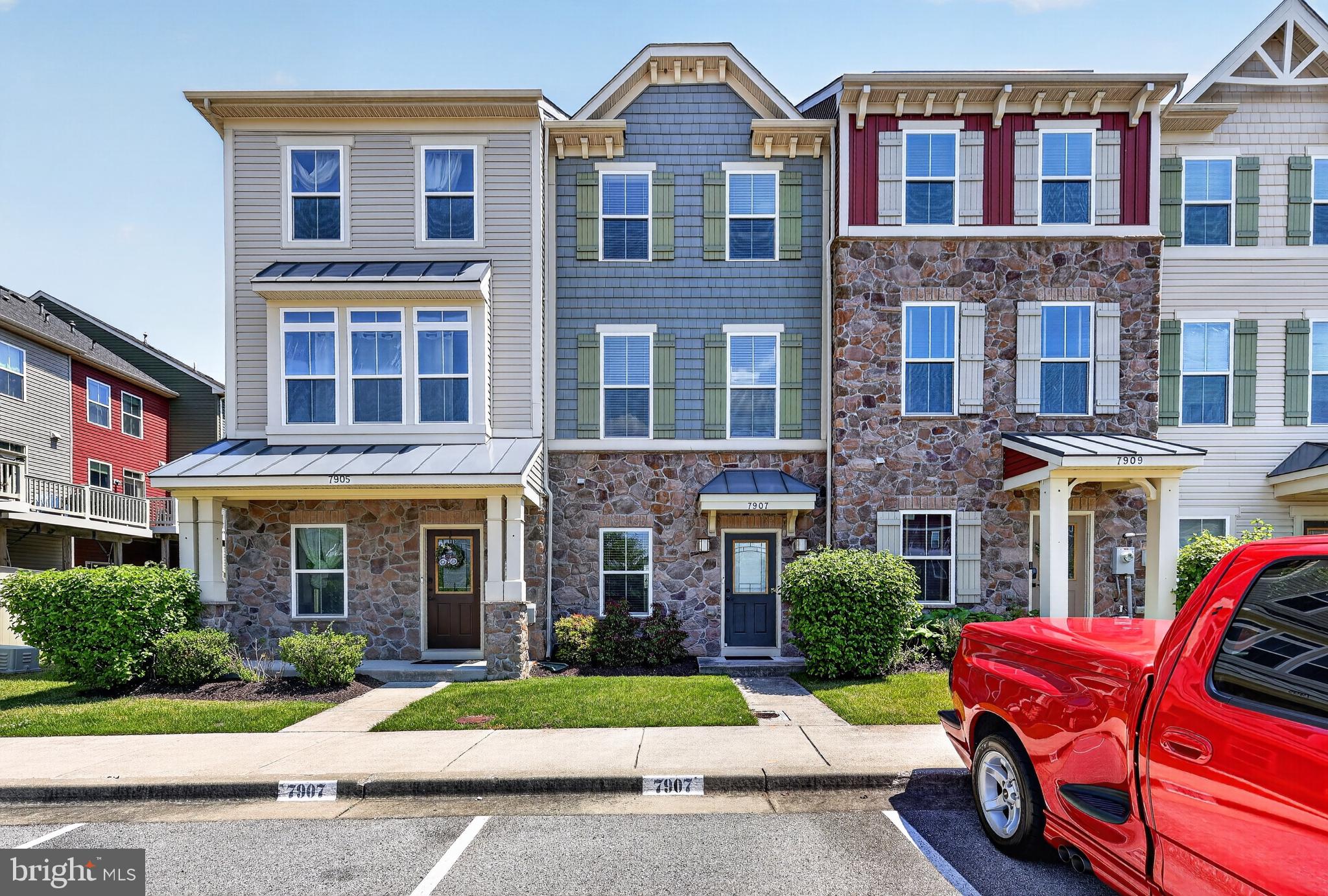 Buyer Closing Help Available!!! Welcome to 7907 Trailview Crossing in the sought-after Creekside Village community! This beautifully maintained townhome offers three levels of finished living space with 9-foot ceilings and modern upgrades throughout. The spacious kitchen features 42-inch white cabinetry, granite countertops, stainless steel appliances, a pantry, breakfast bar seating, and a gas range—perfect for everyday living and entertaining.

The upper level features a luxurious primary suite complete with an en-suite bath, an additional large bedroom, and a second full bath, providing flexible living options for family or guests. The main level showcases beautiful hardwood flooring and recessed lighting, creating a warm and inviting atmosphere. The lower level boasts an optional third bedroom, ideal for guests, a home office or a spacious family room that provides a comfortable gathering space, complemented by a convenient half bath.

Enjoy all the amenities Creekside Village offers, including a resort-style pool, splash pad, fitness center, clubhouse, dog park, pavilion, and scenic walking trails. Conveniently located near shopping, dining, commuter routes, and major highways, this home combines comfort, style, and convenience in one exceptional package.