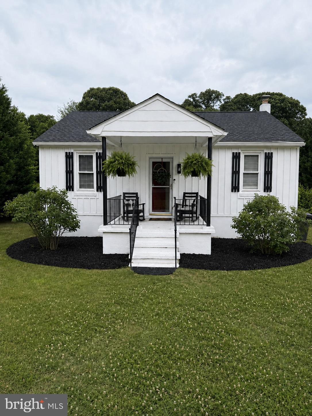 Welcome to 8829 Fort Smallwood Road, a beautifully renovated and move-in-ready home offering the perfect combination of modern updates, timeless character, and exceptional outdoor living. Thoughtfully redesigned by the current owner, this property showcases an open-concept floor plan highlighted by soaring vaulted shiplap ceilings that create a bright, spacious, and inviting atmosphere throughout the main living area.

The centerpiece of the home is the stunning living room, featuring a custom-built entertainment wall with a modern electric fireplace, shiplap surround, and handcrafted wood mantel. This impressive focal point creates the perfect setting for everyday living, relaxing evenings, and entertaining family and friends.

Extensive improvements throughout the home provide both style and peace of mind, including fresh interior paint, updated hardwood flooring, new bedroom carpeting, a newer HVAC system, newer water heater, and updated plumbing lines. Every detail has been thoughtfully considered to create a home that is truly move-in ready.

The newly finished lower level significantly expands the home’s usable living space and offers endless possibilities as a family room, media room, home office, fitness area, guest retreat, or recreation space. This additional finished area provides flexibility rarely found in homes of this size.

Outside, enjoy your own private backyard oasis featuring a spacious rear deck overlooking an expansive yard and swimming pool. Whether hosting summer gatherings, enjoying family cookouts, or simply relaxing outdoors, this property is designed for making memories.

Additional exterior enhancements, including attractive Azek siding accents and updated curb appeal features, further distinguish this home from the competition.

Situated on a generously sized lot with potential subdivision opportunities (buyer to verify), this property presents a unique opportunity for homeowners, investors, or anyone seeking room to grow. Conveniently located near shopping, dining, parks, marinas, waterfront attractions, and major commuter routes, this home offers the perfect balance of comfort, convenience, and future potential.

With its open-concept design, vaulted ceilings, extensive renovations, finished lower level, modern systems, backyard retreat, and subdivision potential, 8829 Fort Smallwood Road is a rare opportunity to own a truly turnkey property in one of Pasadena’s most desirable locations.