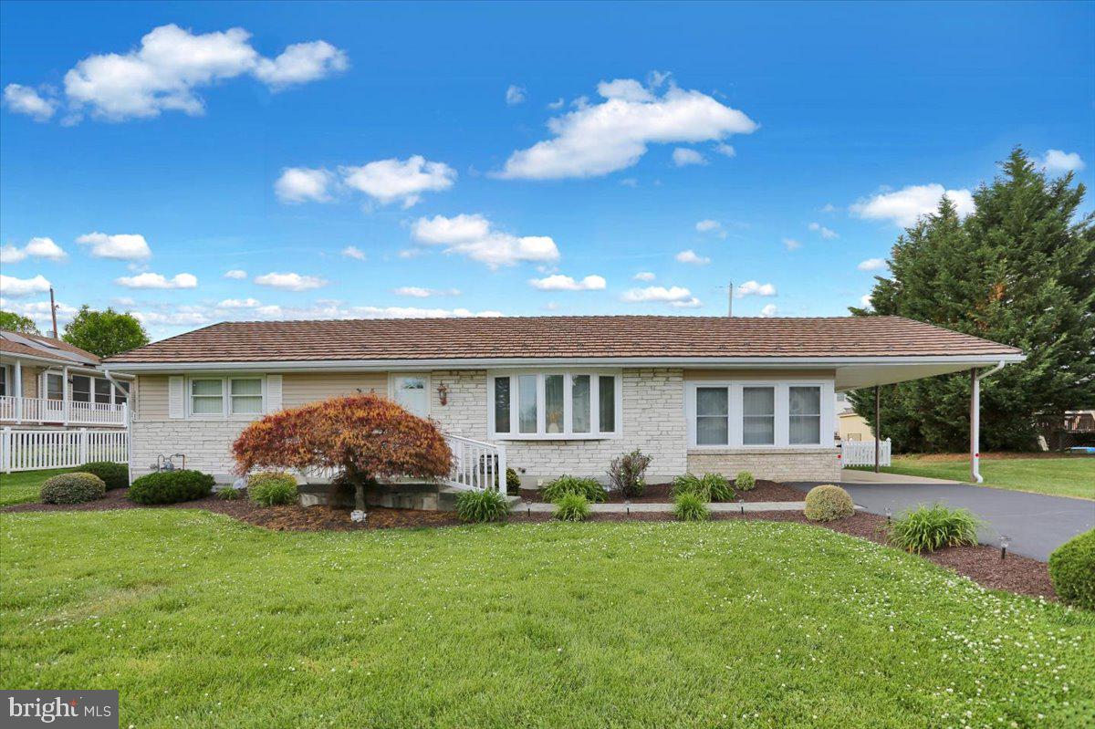 Very nice well kept ranch style home in Riverview Park, featuring 3 bdrms, office,1st fl family rm, a  large finished LL rec room with dry bar, carport and huge 2 car detached garage in backyard, great for car enthusiast or great high ceiling work area. The backyard offers a relaxing 36' x 27' cement patio, outstanding space for entertaining, and more off street driveway parking if needed. This home offers 3 nice sized bedrooms and an office all on the main level, serviced by a modern bathroom with a tub and shower. When you enter this home you will notice the 24' livingrm to your right,with a bay window, that flows into the modern eatin kitchen with plenty of cabinent space and a 24' family room off the kitchen with doors to the front and back yards. The lower level consists of a 24 x 23' rec room with a bar area and powder room, providing  lots of room for indoor entertainment and a large utility area for storage. Very economical gas heat and central air and a well maintain exterior and  landscaping make this home a really great value in this market. Don't miss this one.