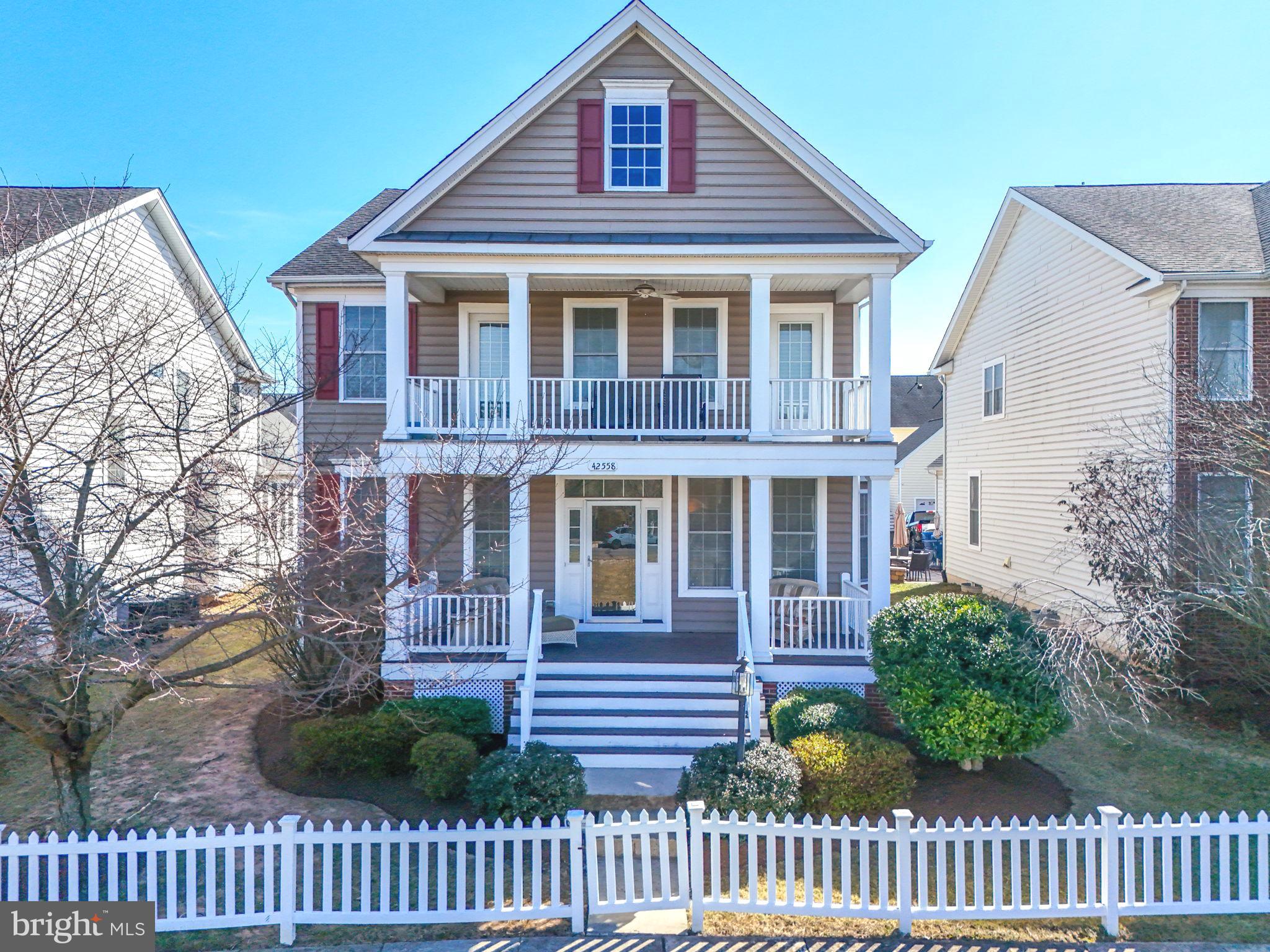 Welcome to this exquisite Vicksburg model home, nestled in the highly sought-after community of South Riding noted for its vast amenities. This exceptional residence, the largest within the Village Series crafted by Toll Brothers, offers over 3,600 square feet of meticulously designed living space across four finished levels. A rare bonus feature is the loft with its own private full bath, enhancing the home’s versatility.
For those who relish outdoor living, this home does not disappoint. Two elegantly covered porches provide picturesque views of a tranquil tree preserve and expansive lawn. A spacious Trex deck and paver patio create the perfect setting for al fresco dining, grilling, and relaxation in multiple serene outdoor zones.
Upon entering, you are greeted by freshly painted, neutral walls on both the main and upper levels, complementing the beautifully appointed hardwood floors that flow seamlessly throughout the main living spaces. The sunroom features durable vinyl flooring, ideal for plant enthusiasts, offers a light-filled retreat. The welcoming foyer opens to the formal living and dining rooms on the left, while the home office, featuring French doors for added privacy, is positioned to the right. All these rooms are bathed in abundant natural light streaming through numerous windows, creating a warm and inviting atmosphere.
At the heart of the home lies the gourmet kitchen, featuring updated stainless-steel appliances, an expansive kitchen island, maple cabinetry, granite countertops, and a neutral backsplash. The spacious casual dining area, provides French door access to the outdoor living areas, offering the perfect spot to start your day. Adjacent to the kitchen, the generously sized family room exudes comfort, complete with a gas fireplace to warm the room on cooler evenings. The sunroom, accessible from the family room, provides endless possibilities—it can serve as a mudroom, a second home office, a plant haven, or a space for your hobbies. It also opens to the deck and leads to the attached two-car garage, which features additional storage space.
The second level reveals a luxurious Primary Suite, complete with a spacious bedroom, an elegant sitting area, and double French doors leading to a private covered porch—a perfect spot for savoring a morning coffee, unwinding with a book, or enjoying an evening glass of wine. This serene retreat offers two walk-in closets and a spa-inspired bath, featuring a jetted Jacuzzi soaking tub, a separate shower, dual vanities, and a private water closet. Additionally, there are two well-appointed bedrooms on this level that share a beautifully designed bath with dual vanities. A conveniently located laundry room completes this level.
Ascend to the bonus loft level, which offers endless potential as a fourth bedroom, complete with its own full bath, offering privacy and comfort. The finished lower level is designed for entertainment, with a spacious recreation room that includes designated zones for a bar area, a pool table, and a TV area. A full bath services this level, while a generous storage area, complete with an egress window, provides the possibility for a future fifth bedroom if desired.This home epitomizes sophisticated living in a prime location, offering an abundance of space, style, and versatility for every aspect of modern living. Porches and deck being power washed 3/13 in the morning. The seller works from home, and will be in the front office while you are touring.
Recent Updates on 42558 Neighborly Lane
FURNACE REPLACED 2024--HOT WATER HEATER REPLACED 2024--DOUBLE OVEN AND DISHWASHER REPLACED 2022--NEW KITCHEN AID COOKTOP 2025--NEW REFRIGERATOR 2025
FRESH PAINT ON MAIN AND UPPER LEVELS 2025--LOWER LVEL PAINTED 2022--FIREPLACE CLEANED AND SERVICED 2025--SUMP PUMP REPLACED 2020