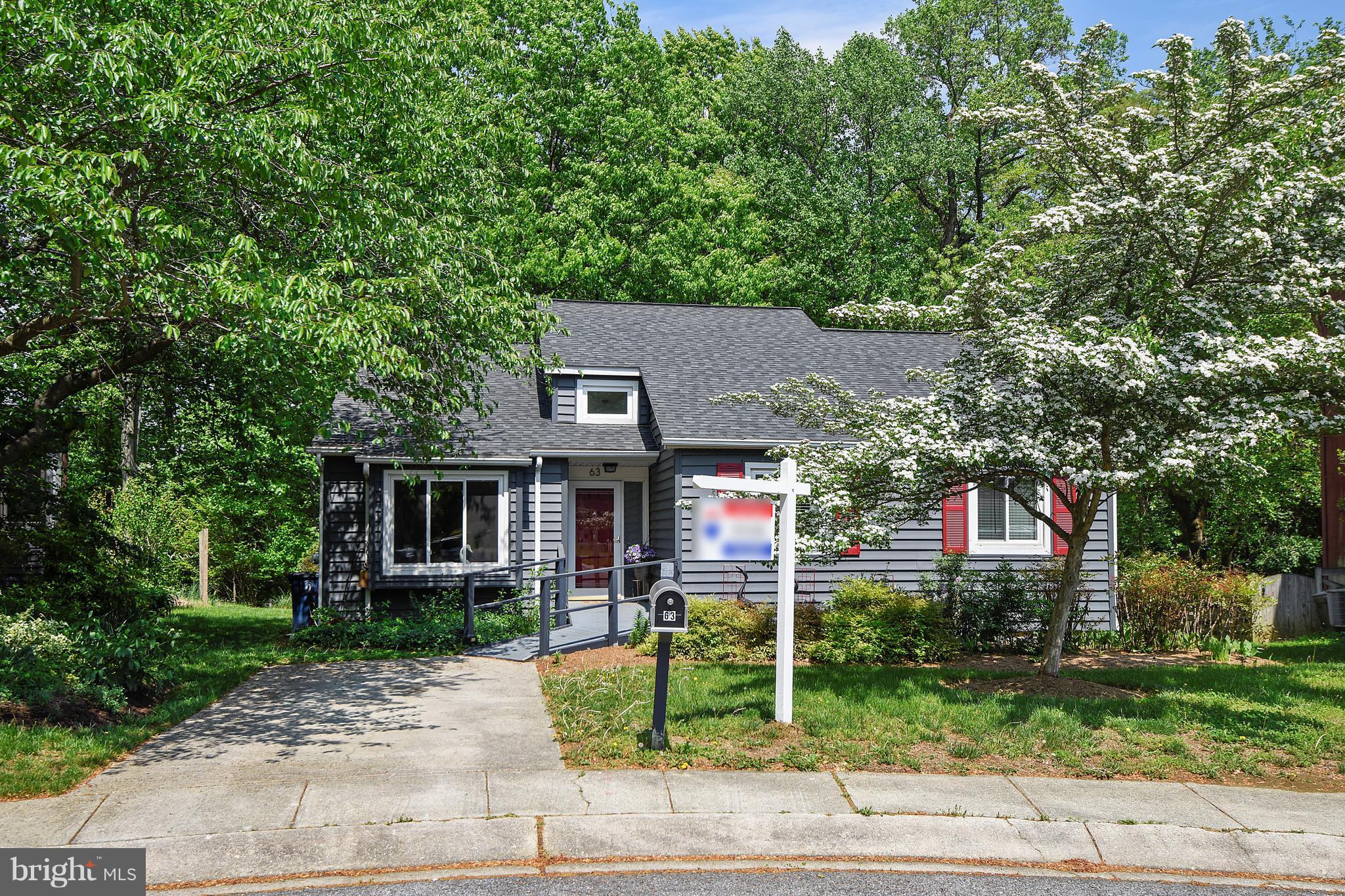 Absolutely immaculate contemporary home. Huge addition added in back with gas fireplace. Open layout with lots of room.  Deck and rear yard backs to woods. Front ramp, master bath and bedroom doors are handicap accessible. Vaulted ceilings. MBR walk in closet. Granite counters. Stainless steel appliances. Hardwood floors throughout. Large shed in backyard. Beautiful home close to shopping.