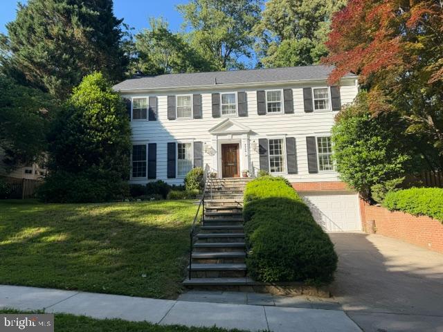 Beautifully updated and meticulously maintained Colonial offering generous living spaces, abundant natural light, and timeless architectural details throughout. A gracious entry foyer welcomes you into the home, where gleaming oak hardwood floors flow seamlessly throughout the main and upper levels. The gourmet kitchen features granite countertops, stainless steel appliances, and a sun-drenched breakfast area surrounded by windows overlooking the private backyard.

The spacious floor plan includes an impressive home office, oversized formal and casual living spaces, and exceptionally large bedrooms with ample closet space. The finished lower level provides additional recreation space, a wine cellar, and a cozy second fireplace.

Two sets of French doors open to a beautiful flagstone patio and expansive, professionally landscaped backyard, creating the perfect setting for entertaining, play, or quiet outdoor enjoyment. Ideally situated on a private lot, this exceptional home offers the perfect combination of elegance, comfort, and functionality.