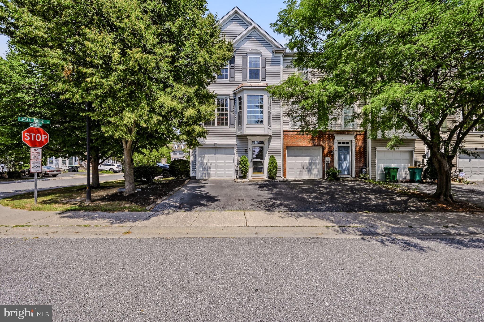 Welcome to 32 Glennwood Drive, a spacious 3-bedroom, 2.5-bath end-unit townhome in Glennwood Station in Newark, DE. Set on a corner lot, this home offers added outdoor space, a fenced rear yard, and a one-car garage.

The main living level features 9-foot ceilings, hardwood floors, recessed lighting, crown molding, chair rail, wainscoting, and two bay windows that bring in natural light. The large eat-in kitchen offers upgraded cabinetry, quartzite countertops, a center island, pantry, gas cooking, and hardwood flooring.

Upstairs, the primary suite includes a vaulted ceiling and a private bath with a soaking tub and separate stall shower. The laundry area is located on the bedroom level for added convenience. The lower-level family room provides flexible living space and features sliding doors that open to the fenced backyard.

Additional highlights include a newer roof, updated HVAC, and a convenient location near shopping, dining, major routes, and everyday services. With generous room sizes, thoughtful upgrades, and an end-unit setting, this home offers comfort, function, and convenience. Schedule your showing today.

Property is located within 5 miles of Newark Charter School!

All information is deemed reliable but not guaranteed and should be verified by buyer and buyer’s agent.