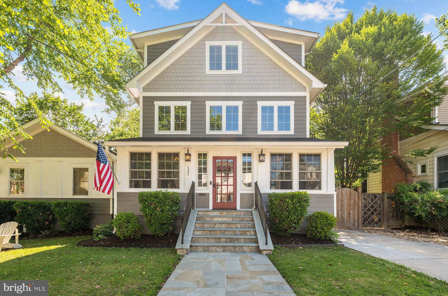 Welcome home to Arlington Heights  where this exceptional property is a rare find, pairing the timeless architectural character of one of Arlington's most storied historic neighborhoods with thoughtfully designed living space that unfolds beautifully across multiple finished levels. An original feature of the home, the charming enclosed porch greets you first with a vaulted wood ceiling and built-in bench seating offering a quietly special space that instantly slows the pace of the day, whether you're savoring morning coffee or winding down at dusk. Rich hardwood floors carry throughout the entire main level, where a coffered-ceiling foyer doubles as a cozy sitting room anchored by a fireplace, setting a warm and welcoming tone before opening into a generously sized dining room beneath a statement chandelier perfectly positioned for everything from weeknight dinners to holiday gatherings. The kitchen is a true heart-of-home space, featuring a generously sized center island, stainless steel appliances, wood countertops, abundant cabinet storage, and a bright window bank that frames the lush backyard beyond. A dramatic vaulted-ceiling family room with its own stone fireplace commands attention and offers the kind of generous, flexible space that adapts effortlessly to everyday living and large-scale entertaining alike. A private office provides a quiet, dedicated work-from-home retreat, and a main-level bedroom with its own en suite bath makes single-floor living an option from day one. The second level is anchored by a primary suite that feels like a destination unto itself with a generously sized bedroom with French doors opening onto a private balcony, its own adjoining living room for a true retreat experience, two spacious walk-in closets, and a luxurious en suite bath featuring dual vanities and a soaking tub. Upstairs, a lofted landing space sets the stage for two additional bedrooms connected by their own shared living room, a second office, and a well-appointed full bathroom with dual vanity, a layout that offers remarkable flexibility for multigenerational living, long-term guests, or simply room to spread out. Don't miss both finished lower levels, one is a dedicated theater room with a snack bar and full seating that conveys with the home, designed for the ultimate movie night or game day experience, while the other functions as a fully independent living space complete with a kitchenette featuring a dishwasher, fridge, and sink, plus a full bathroom, ideal for an au pair, in-law suite, or extended stay guests. Step outside and discover an outdoor living experience that rivals the interior. A large, grassy fenced backyard framed by mature trees anchors a built-in outdoor kitchen with a grill, sink, and storage, a shaded pergola seating area perfect for long summer evenings, and a charming storage shed tucked into the landscaping. Owned solar panels add lasting value and energy efficiency, a forward-thinking feature that complements everything this home has to offer. A driveway plus ample street parking add everyday ease. Just minutes to Columbia Pike's vibrant shops, restaurants, and entertainment including neighborhood staples like Bob and Edith's Diner and the Arlington Cinema & Drafthouse with quick access to Route 50, Glebe Road, I-395, and the Virginia Square-GMU Metro station, this is the kind of home that rarely comes to market in a neighborhood this special - schedule your private tour today.
