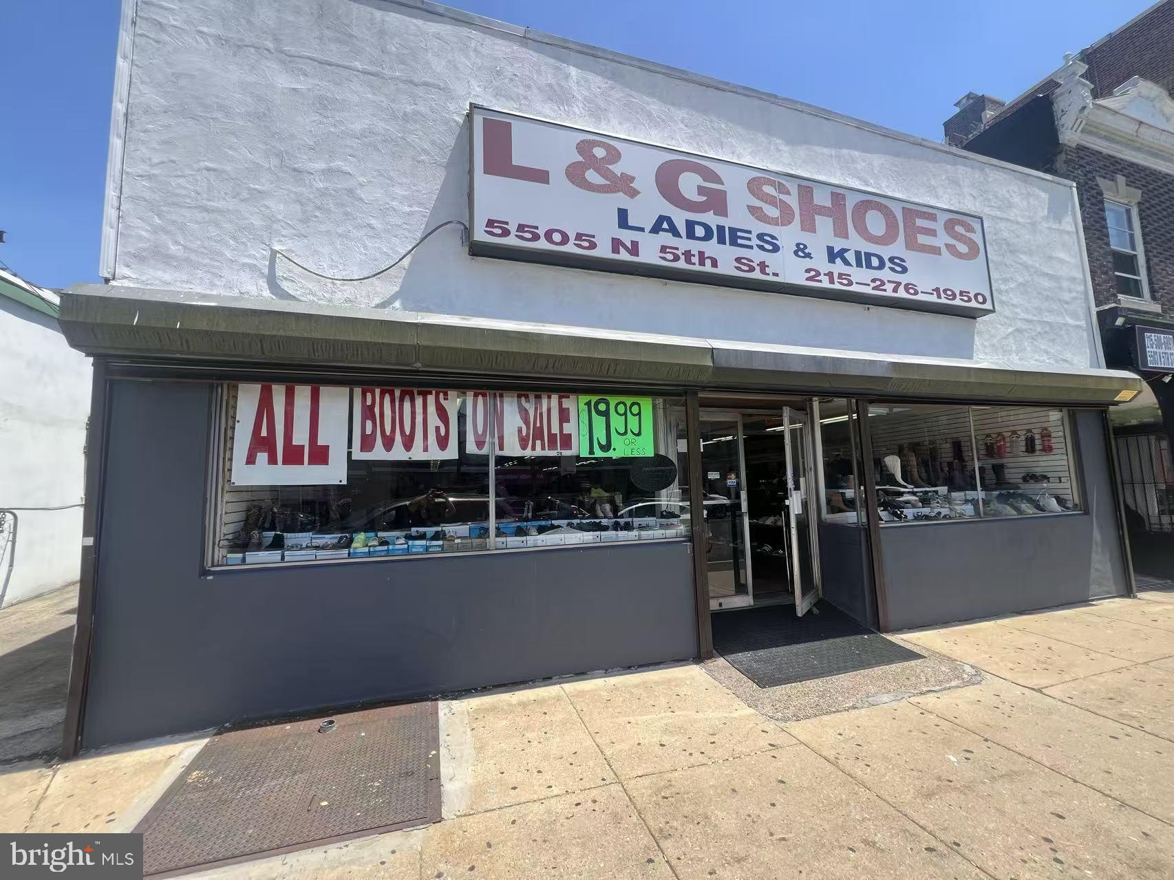 A large, modern two-story commercial mixed-use building with a spacious open layout and bright lighting, offering a comfortable and functional environment. The property includes an upstairs level that can be used for additional retail space, offices, or other business purposes. Wide aisles and well-organized areas make it convenient for customers and staff. Parking lot is located next to the building, with easy access for unloading goods and deliveries.