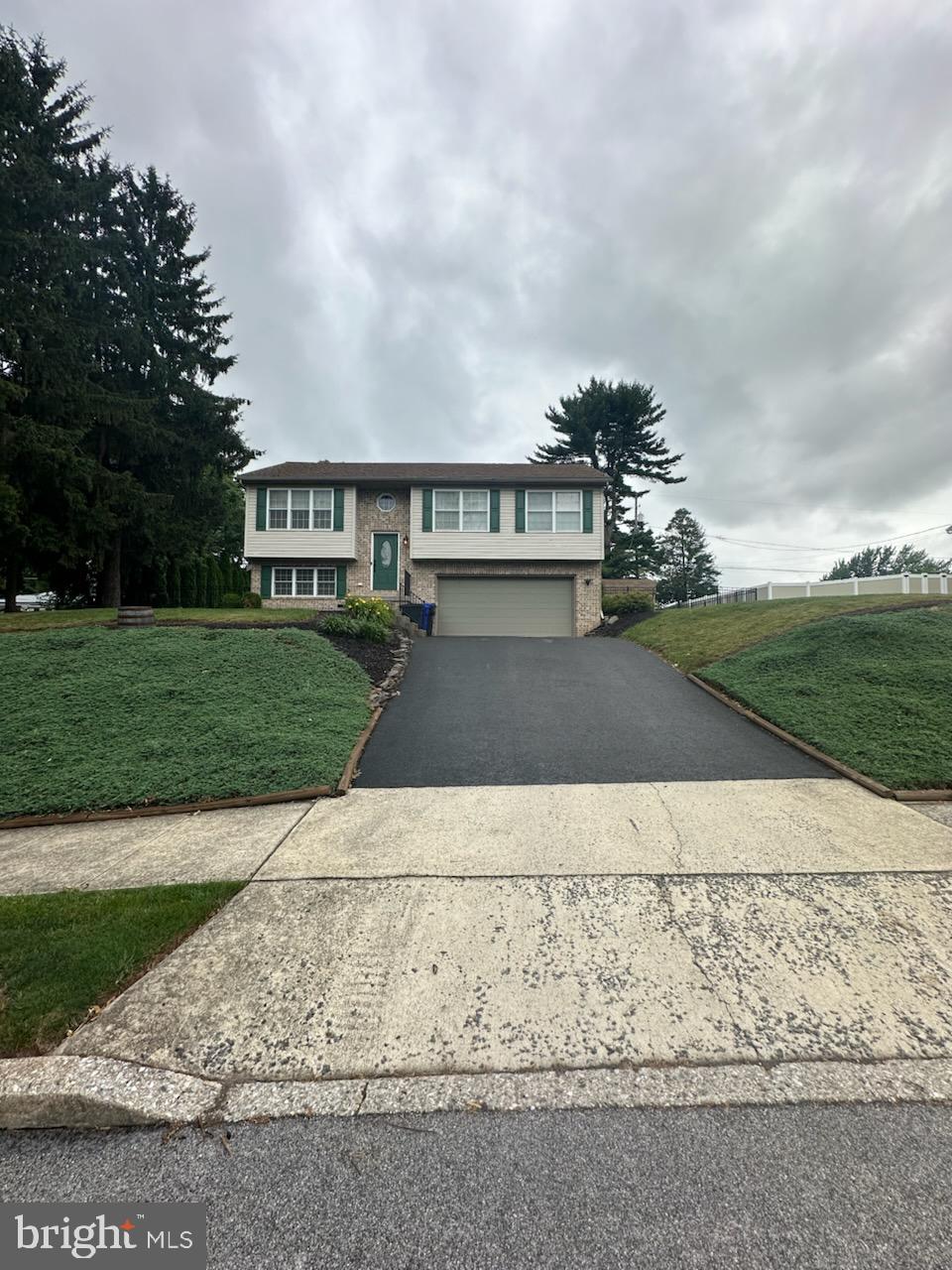 Welcome home to this well-maintained 3-bedroom, 2.5-bath bi-level nestled in an established neighborhood in New Cumberland and the West Shore School District. Situated on a landscaped lot with fantastic curb appeal, this home offers a spacious layout, a 2-car garage, and plenty of room to enjoy both indoor and outdoor living.

Inside, you'll find comfortable living spaces designed for everyday living and entertaining, while outside, the generous yard provides the perfect setting for relaxing, gardening, or hosting gatherings with family and friends.

Conveniently located just minutes from Route 83, the Pennsylvania Turnpike, downtown Harrisburg, shopping, dining, and local parks, this home offers the perfect balance of neighborhood charm and easy access to everything the West Shore has to offer.

Please note: The sellers are purchasing another home and have agreed to provide a leaseback to their sellers through September 20, 2026. As a result, the sellers of 103 Greenwood Drive will require a leaseback occupancy agreement through September 20, 2026, and buyers should plan accordingly. Including this arrangement upfront provides a smooth transition for all parties involved.

Don't miss the opportunity to make this wonderful New Cumberland property your next home!