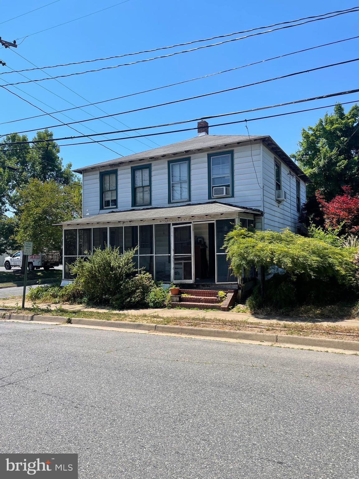 Exceptional redevelopment opportunity in the City of Fredericksburg. Situated on a prominent corner lot totaling approximately 0.10 acres with I-1 zoning, this property offers strong potential for investors, builders, or business owners seeking a strategic downtown location. The existing 3-bedroom, 1-bath home is being sold strictly as-is and is considered a tear-down. Conveniently located near Downtown Fredericksburg, the VRE, Route 1, and I-95, with excellent visibility and accessibility. Buyer to verify all intended uses, zoning regulations, and development potential with the City of Fredericksburg.
