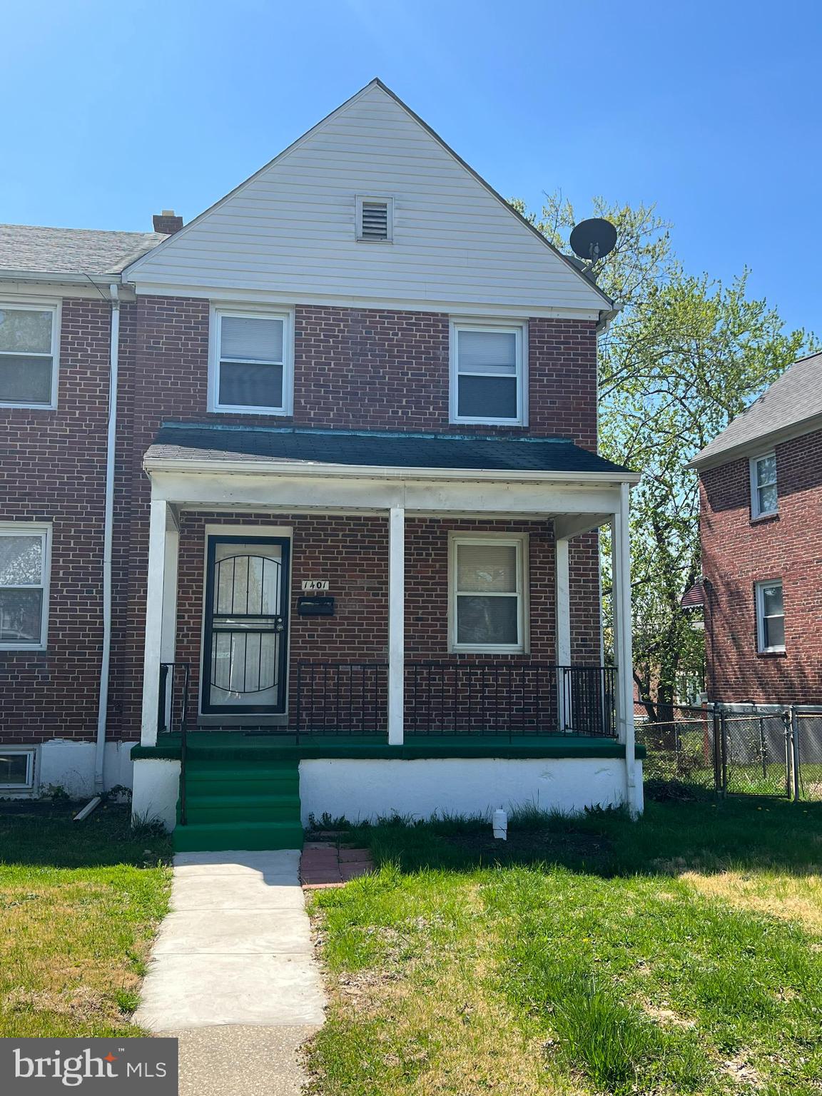 Beautiful renovated home . front porch and fenced in backyard. This home has hardwood floors throughout. It is freshly painted in neutral colors. End unit has natural light. The lower level has a washer and dryer and a half bath. Vouchers Are Welcome!