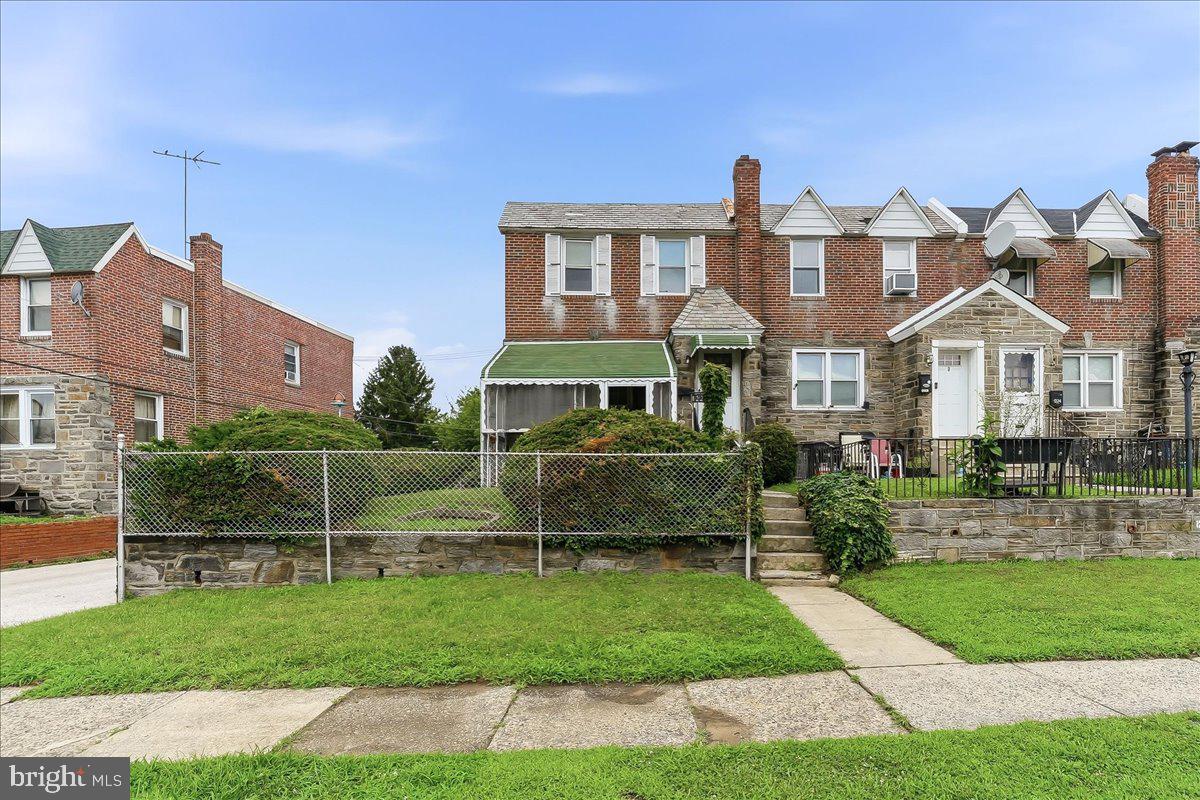INVESTOR ALERT!!   A large solid end of row located on a great street. What an opportunity!  You'll first notice the front patio walking up to the home.  A large living room greets you when entering the home.  The formal dining room has a chandelier and a window a.c. unit.  It also has a side door to a small porch and stairs to the back yard. The eat in kitchen has tile walls and vinyl floor.  The 2nd floor has a master bedroom with a ceiling fan.  This room has updated windows and 3 closets.  There are 2 additional bedrooms on this level. All bedrooms are carpeted.  The original bath has a tile floor and walls. The basement is unfinished and enlarged to add space within the old garage area.  The laundry area and utility room are on this level also.   The  large back yard is great!  It is fenced and allows for 2 parking spaces in the fenced area along with a lovely picnic area.  You'll also find a storage shed in the fenced back yard.   What a location too.  Walk to shopping.  A quick drive to all major roadways and the airport is only minutes away!   The house is being sold in As-IS condition.  Buyer will be responsible for any repairs necessary to complete settlement.  This includes the municipality inspection. But Potential Galore!!!