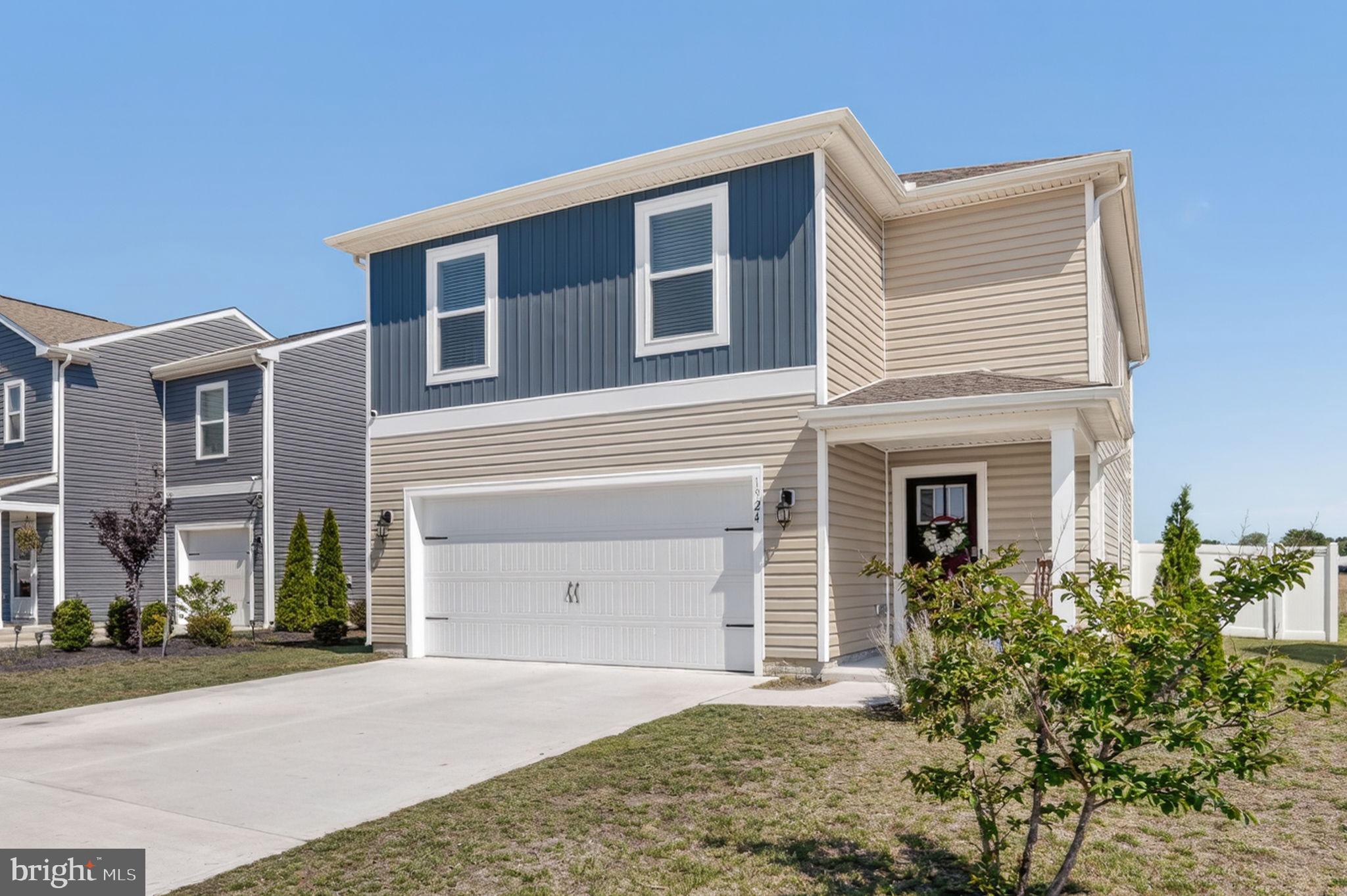 Why wait for new construction when you can move right into this beautifully maintained 2024 home? Offering 4 bedrooms, 2.5 baths, and over 2,000 square feet of thoughtfully designed living space, this nearly new home combines modern style, comfort, and convenience.

Step inside to a bright open floor plan featuring luxury vinyl plank flooring throughout the main level, recessed lighting, and abundant natural light. The spacious family room flows seamlessly into the dining area and kitchen, creating the perfect setting for everyday living and entertaining. The kitchen is a standout with white shaker cabinetry, stainless steel appliances, ample counter space, and a large center island with seating for four.

Upstairs, the generous primary suite provides a relaxing retreat with a walk-in closet and private bath. Three additional bedrooms, a full hall bath with double vanity, and a convenient second-floor laundry room offer plenty of space for family, guests, hobbies, or a home office.

Outside, enjoy a fully fenced backyard with room for pets, play, gardening, or outdoor gatherings. The rear deck is ready for summer barbecues and relaxing evenings, while the open views beyond the backyard add to the sense of space and privacy. An attached two-car garage provides additional storage and convenience.