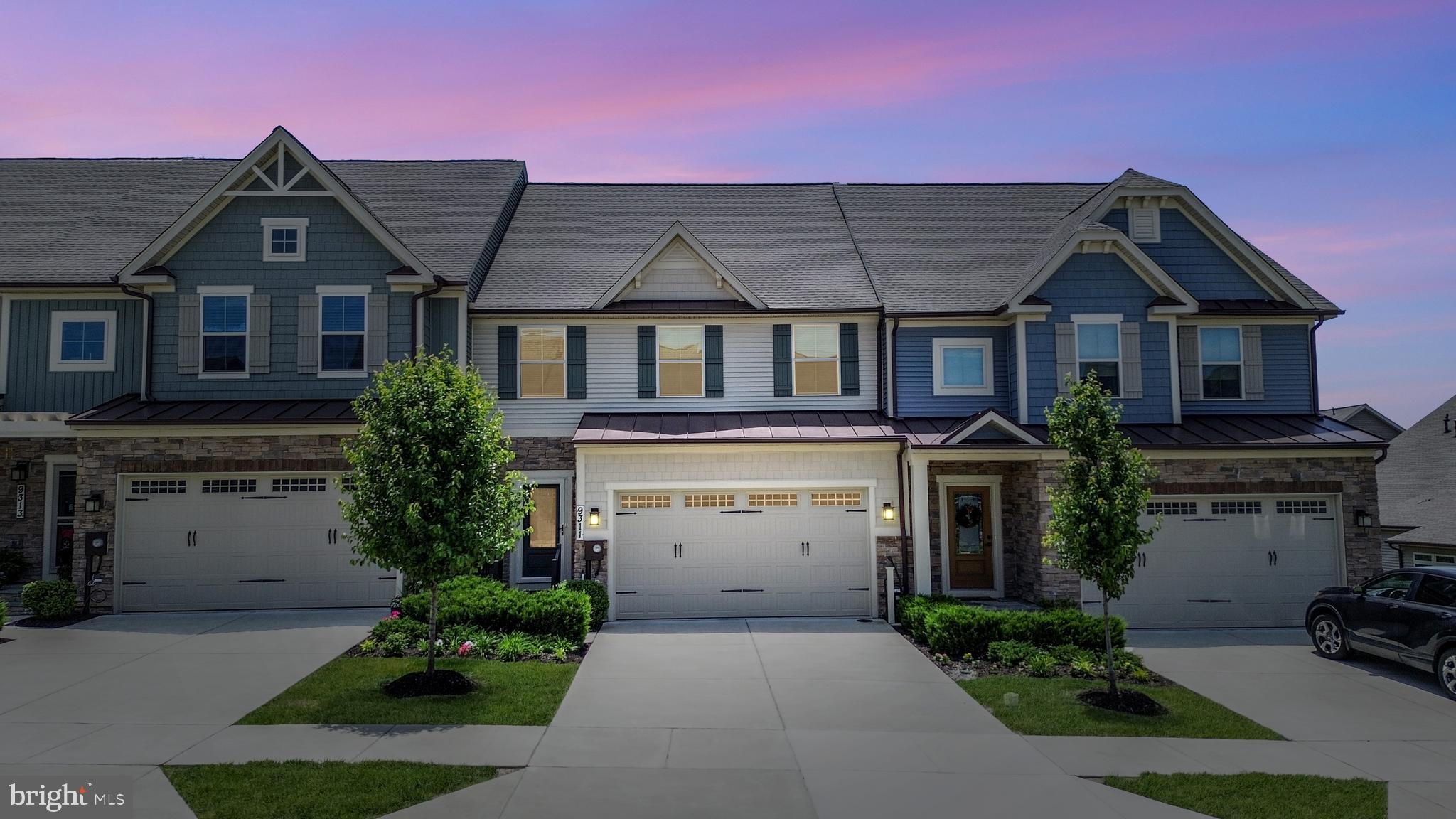 Welcome to The Woodlands, Urbana Maryland's coveted 55+ community! And welcome home to this lovely villa situated in a prime location in the neighborhood--walk to the Clubhouse, pool, Herb Garden, pavilion, pickleball, and bocce courts! This home epitomizes low-maintenance living and convenience with its first-floor Primary Suite! As you step inside this magnificent Griffin Hall model villa, you'll immediately notice the impeccable attention to detail and luxury finishes throughout. The family room with vaulted ceilings is a true gem. Whether you're looking to unwind after a long day or spend quality time with loved ones, this space provides the perfect setting for relaxation and comfort. The family room opens to an inviting screened-in porch, upgraded with a ceiling fan — a great spot to enjoy your morning coffee or relax in the evening. Step out from the screened-in porch to the low-maintenance deck overlooking the backyard. The upgraded kitchen is a chef's dream, featuring granite counters, a double oven, stainless steel appliances, a large peninsula with a breakfast bar, and expansive built-in cabinetry for extra storage. Whether you're hosting a dinner party or simply enjoying a cup of coffee, this kitchen is the perfect place to gather and make memories. The first floor boasts a convenient Primary Bedroom suite — with a luxe Primary Bath featuring a spacious dual vanity and a stunning tile shower with a built-in bench. The Primary Bedroom also features an oversized walk-in closet and an elegant tray ceiling. Additionally, the first floor features a convenient laundry room/mudroom with a custom motorized shade, a half bathroom, and access to the two-car garage. Offering privacy for guests, the upper level features two more spacious bedrooms, each with a walk-in closet. This level also includes a full bathroom and a spacious, versatile loft space perfect for entertaining or relaxing! Need extra room for storage? This home is upgraded with a finished storage room on the upper level — adding extra space for storage or use as a craft or hobby room! Downstairs, the light-filled walk-out lower level is an entertainer's paradise — complete with spacious living and recreation areas, great for watching movies, playing games, or relaxing! You’ll also find an additional full bathroom and an extra-large storage area on this level. From here, step out to the professionally landscaped backyard. Living in The Woodlands means you're not only getting an incredible home but also a fantastic community with unmatched amenities. The neighborhood is conveniently located near all the great features of Urbana, including a Market Center with a grocery store, restaurants,  library/senior center, doctors’ offices, and multiple parks, making it easy to enjoy everything the area has to offer. With easy access to I-270, Route 355, and I-70, you will find this home in a prime location. The amenities within the neighborhood are truly exceptional — and include a pool, a fantastic clubhouse with a billiards and poker room, an extensive gym, a yoga/exercise studio, a golf simulator, and meeting rooms for the myriad of community activities. Plus, you can enjoy walking trails, pickleball, bocce courts, an Herb Garden, and a putting green! The community is extremely active, with plenty of activities to keep you busy. Whether it's attending a seminar planned by the Woodlands’ Lifestyle Coordinator, playing pickleball with friends, learning Mahjong or canasta, or taking part in the groups or other planned activities, you'll always have something to do. The Woodlands is the perfect place to meet new friends, enjoy an active lifestyle, and create lasting memories. One of the best perks of living in The Woodlands is that you can spend your time doing what you love instead of worrying about maintaining your lawn, mulching, or shoveling snow. The HOA handles all of that, so you can focus on enjoying your free time.
