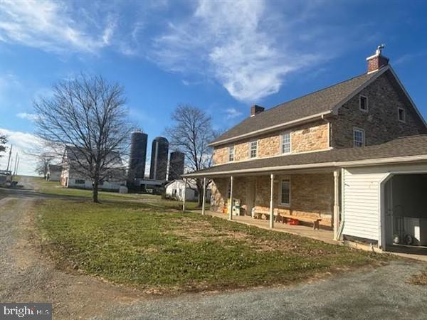 This property will be offered at Public Auction on Thursday, February 15, 2024 @ 1pm.  The listing price is the opening bid only and in no way reflects the final sale price. $ 250,000 down due at auction, 2% transfer tax to be paid by the purchaser, real estate taxes prorated. Nestled in Southern Lancaster County, this gorgeous 115-acre Peach Bottom farm boasts approximately 96 acres of tillable land, numerous outbuildings including a modern 40,000 bird layer house that is approximately 80’x690. The other outbuildings consist of an approx. 40’x320’ shop with warehouse, 3-row free stall barn with drive by feeding and auto scrapers, and a bank barn. The 4-bedroom, sandstone farmhouse has some recent updates and includes an attached 2-car garage. Additional amenities include nearly 16 acres of pasture and easy access to Routes 272 and 222.  THIS FARM OFFERS SEVERAL GREAT SOURCES OF INCOME, IS IN CLEAN & GREEN, CERTIFIED ORGANIC, AND IS NOT PRESERVED.