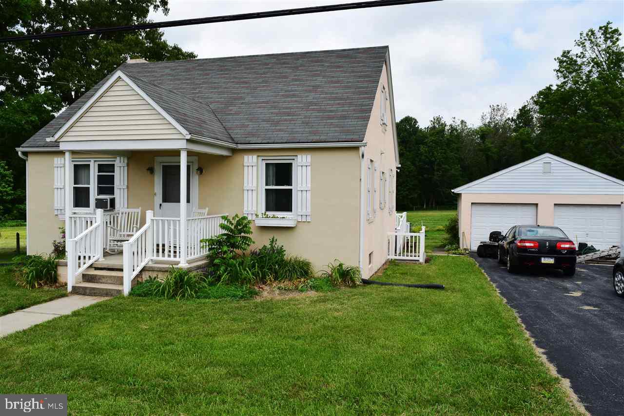 Got Horses? Nice 1.5 story home with 5th bedroom addition, hot tub, 4.8 acres setup for two horses, two car garage, two sheds, horse barn. many new features. Convenient location in a country setting.