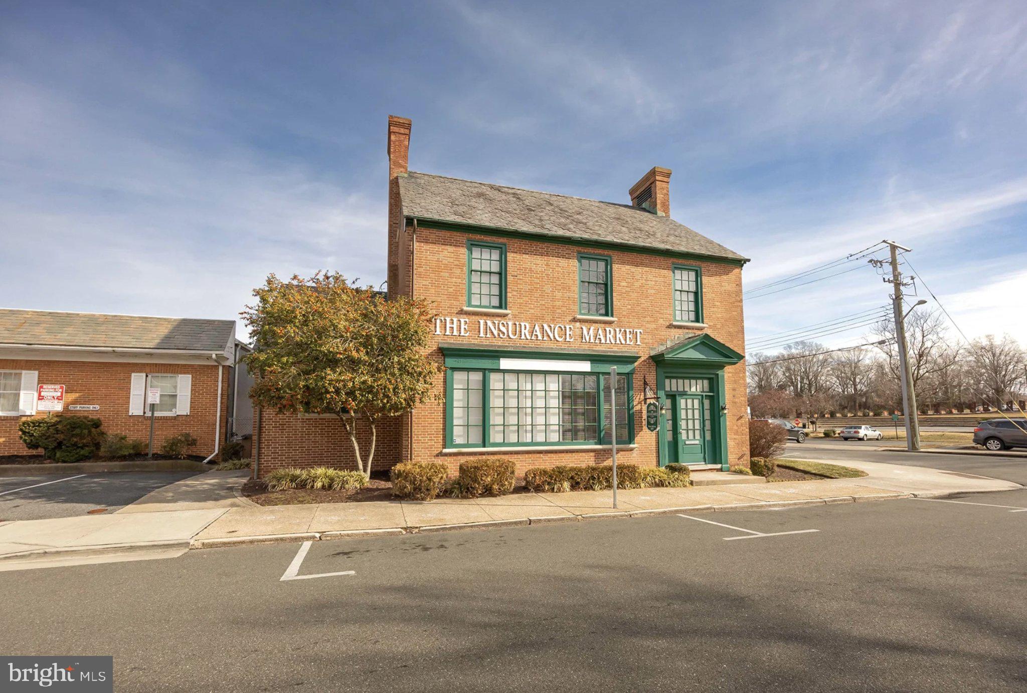 The perfect blend of historic downtown charm and modern sophistication in this fully renovated Class A office space in the heart of Salisbury, Maryland. Ideally positioned on the corner of East Main Street and Poplar Hill Avenue, this premier property offers exceptional visibility, convenience, and accessibility—just minutes from direct access to US Route 13 and the Route 50.

This one-of-a-kind office building features a highly functional and adaptable layout across two spacious floors. The first floor welcomes clients with a professional lobby or reception area and opens into a collaborative bullpen workspace, complemented by four additional offices and a private executive office. One of the offices can easily be converted into a dedicated print or stationery room, offering added flexibility. The floor is further enhanced by a restroom and a large storage or filing room.

Upstairs, the second floor provides a comfortable lounge area, three generously sized private offices, a restroom, kitchenette, and additional storage space.

The property includes a private parking lot accommodating eight vehicles, along with two dedicated on-street parking spaces—an exceptional amenity for downtown Salisbury. The building received a full interior renovation in 2024 and all new windows were installed in Spring of 2026. 

This is a rare opportunity to secure a thoughtfully renovated, high-end office space with ample dedicated parking in one of Salisbury’s most desirable downtown locations.