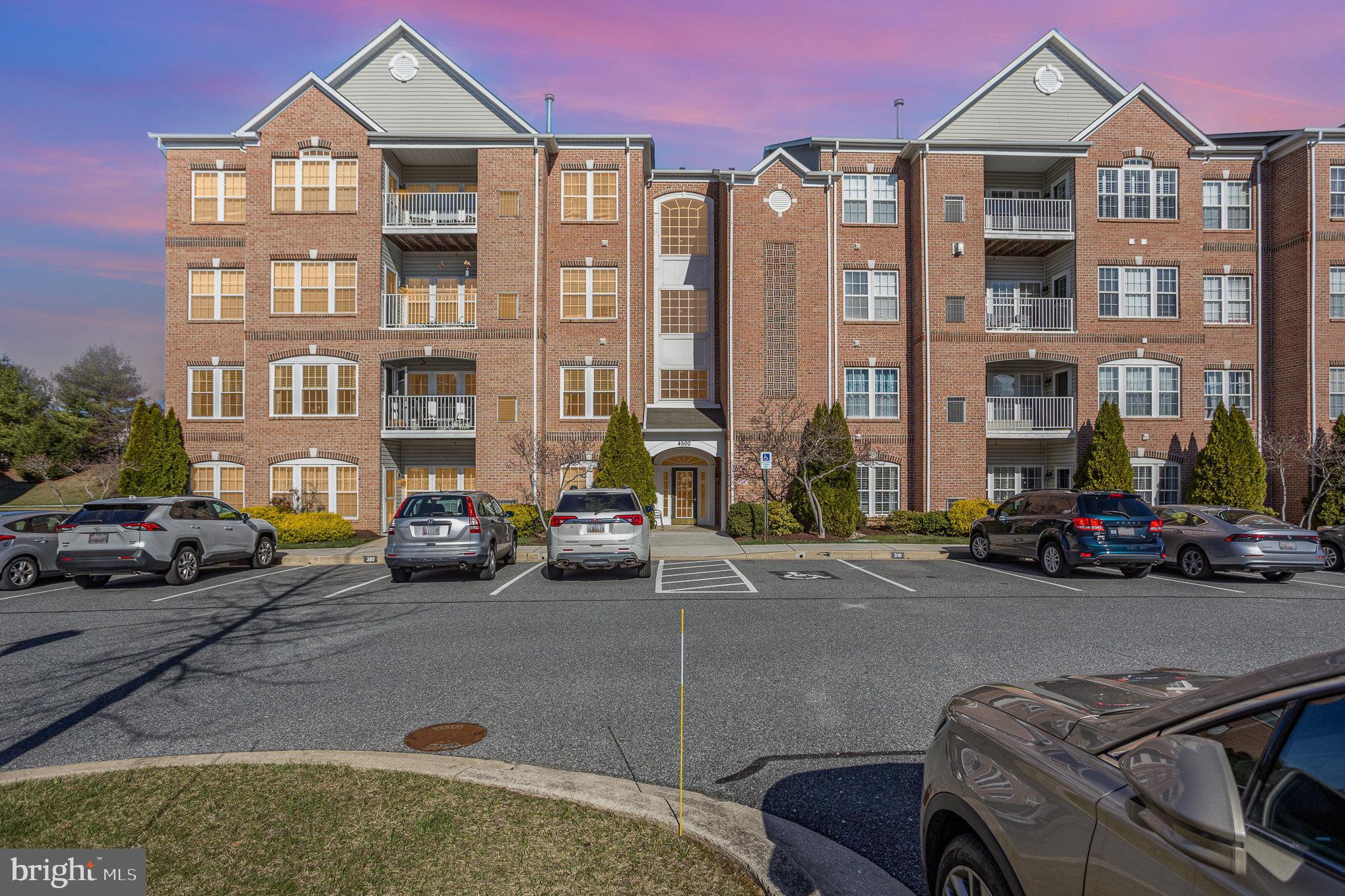 If you have been waiting for the perfect condo in the sought-after community of Windsor at Perry Hall Farms, your wait is over! Step inside and see the value of this stunningly beautiful, well-cared for condo. 
Imagine starting your day – and your car – from the comfort of your bright and cherry breakfast room. With your parking spot just steps away from your private patio you will appreciate the ease and accessibility that living on the ground floor offers. 

As you tour the open floor plan you will notice the many calming and comforting attributes of this home. The neutrally painted walls are pronounced by the white crown molding. Attractive, easy-to-care for LVP flooring flows seamlessly through the living room, separate dining room, kitchen, breakfast/sunroom, both bathrooms, and hallways. Enjoy the warmth of the carpet on your feet as you step out of your comfy beds in the two bedrooms. The kitchen welcomes you to tap into your culinary skills. The unique design of the flat counter space around the sink offers an openness to the adjacent rooms. The granite countertops and backsplash give a sophisticated look, while the 42” cherry cabinets provide additional space for all your kitchen needs. Stainless steel appliances and a pantry complete this delightful area.

The primary bedroom with a large walk-in closet, a cozy area for relaxing, and an ensuite with updated cabinetry, countertops, comfort height toilets, and fixtures will not disappoint. The second bedroom, updated bath, and two closets are located near the front inside entrance of this immaculate home.
Carrier HVAC 2014 and Water Heater 2014.

The community offers well-maintained common areas and walking paths and is conveniently located to shops, restaurants, parks, and much more.

Make an appointment to see this exquisite condo, in a secluded part of the Windsor community, and see for yourself all it has to offer making it an exceptional buy in the current market.

Parking spot is number   313

PLEASE PARK IN SPOT  313    OR ANY UNNUMBERED SPOT.

PLEASE ENTER THROUGH THE PATIO DOOR (NOT THE MAIN FRONT ENTRANCE). SENTRILOCK IS ON THE DOOR HANDLE. THERE IS ONE KEY FOR THE LOWER LOCK.  THANK YOU.