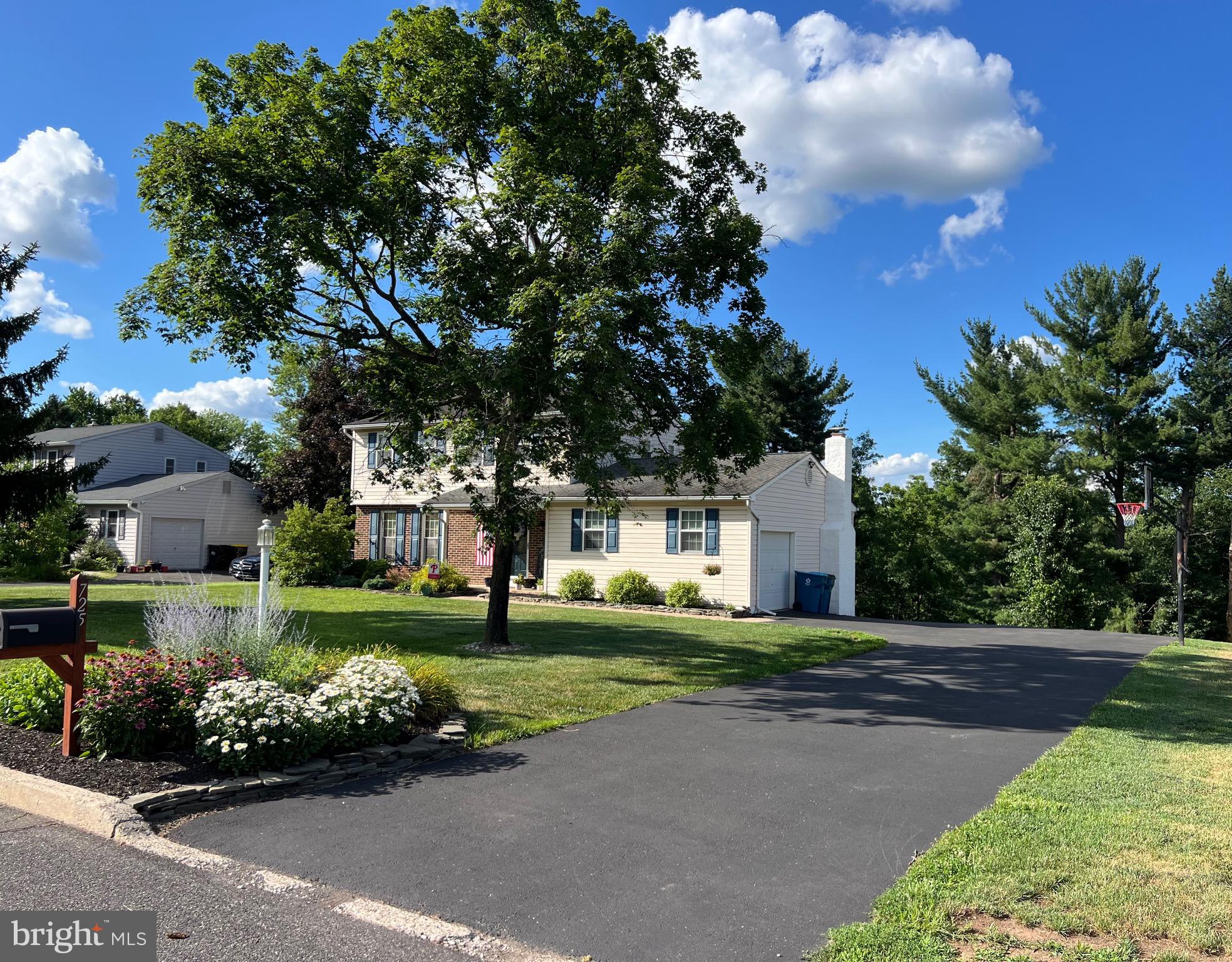 This remarkable home is waiting for it's new owners! Set on a quiet street in the popular town of Harleysville, this three bedroom, two and a half bath Colonial with  charm & character has been extremely well cared for! From the manicured lawn & gardens, to the expert upgrades on the inside & outside, you will be very pleased with what you see. Great lot that backs up to Township property and enjoy the view it offers from your brand new deck! Comfortable living with your Living Room, Dining Room, & Eat in Kitchen which steps down to the Family Room. Updated Kitchen offers granite countertops, stainless appliances, tile flooring & Hickory cabinets, and brand new sliding doors to that new deck. Cozy family room w/ wood burning fireplace overlooks the back yard & provides access to the garage. Hardwood floors complete the main floor & hall powder room. Upstairs are 3 generous bedrooms, main bath & master suite w/ full bath. Hardwood throughout the second floor. Bedrooms have ceiling fans & have been freshly painted. Full finished walk-out basement, (w/ Cedar closet & French doors!) for your additional enjoyment. Close to parks & trails. Plenty of shopping & restaurants nearby. Easy access to major routes to enjoy the city or a trip out to Lancaster County. Shop or dine at the quaint village of Skippack which offers seasonal events during the year as well. This great home is ready & waiting for you. (See attached  list of upgrades & improvements - too many to include here.)