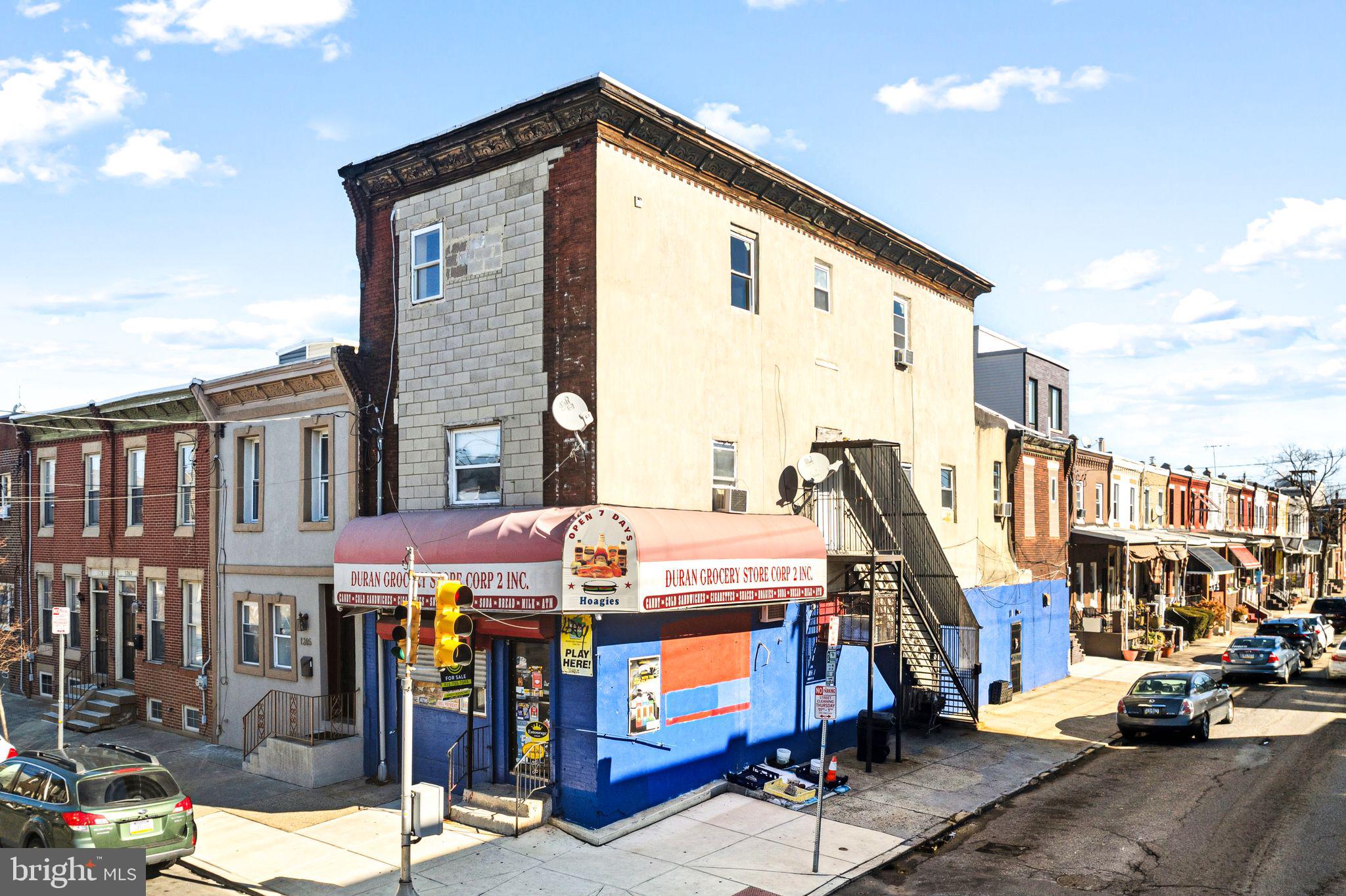 Corner 3-Story building including grocery store, and two 2-bed apartments on 2nd and 3rd floors. Tobacco and Food Prep licenses are included. All equipment and furniture included. 2nd floor apt is leased month to month to long term tenant. 3rd floor is vacant.