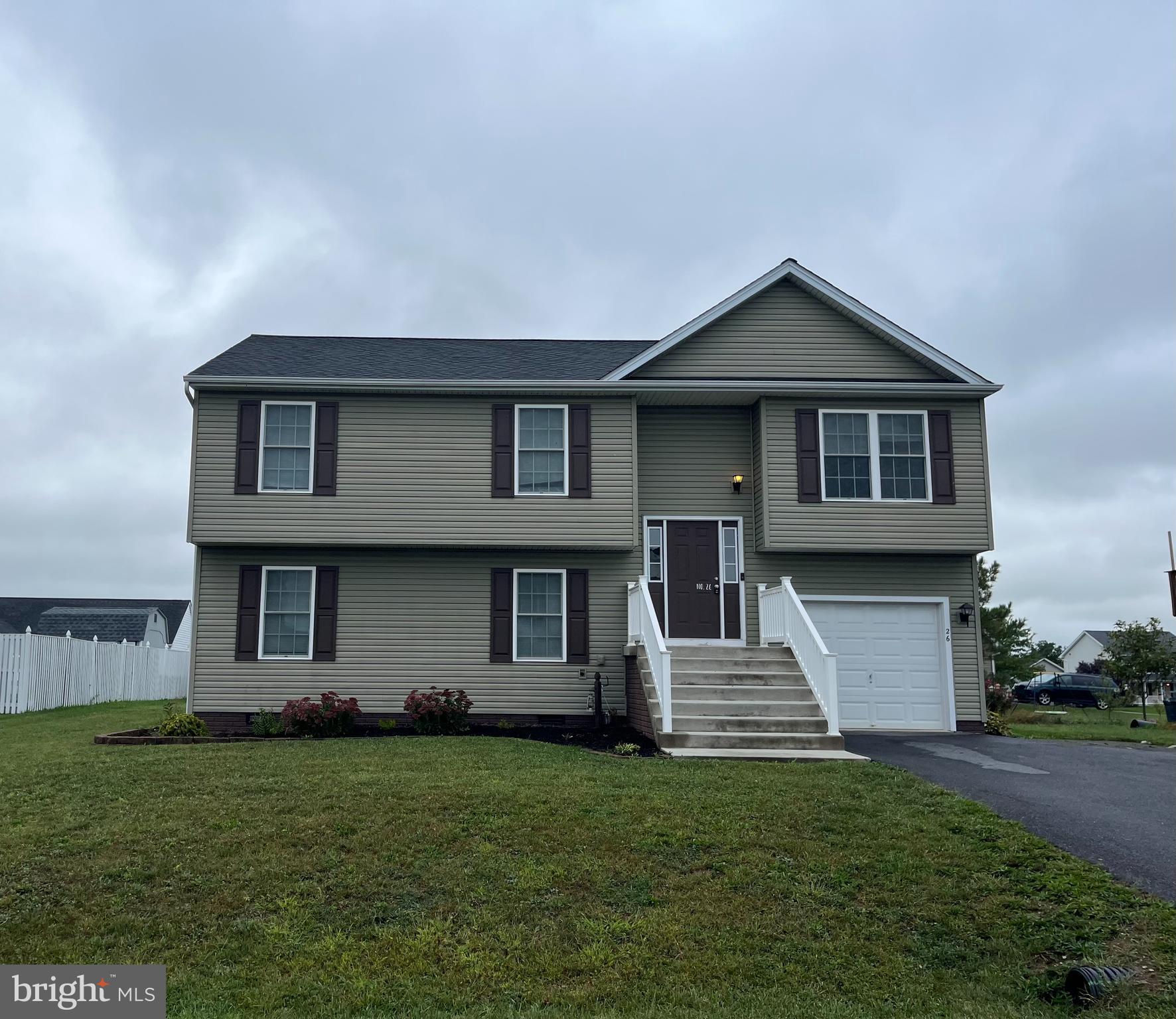 You don't want to miss out on this beautiful home that is move in ready!  This is a well-maintained split foyer that features four bedrooms, three full baths, two living areas, and a rear deck with pergola included.  Upon entering and heading upstairs you will see the open floor plan including liver room, kitchen, and dining area.  Off the dining area is a deck with a view of the spacious backyard.  The basement of the home includes a large rec room, another bedroom,  full bathroom, and some extra storage space.  The garage has been completely finished as well and includes shelving that could be used for a workshop.  Schedule your showing today!