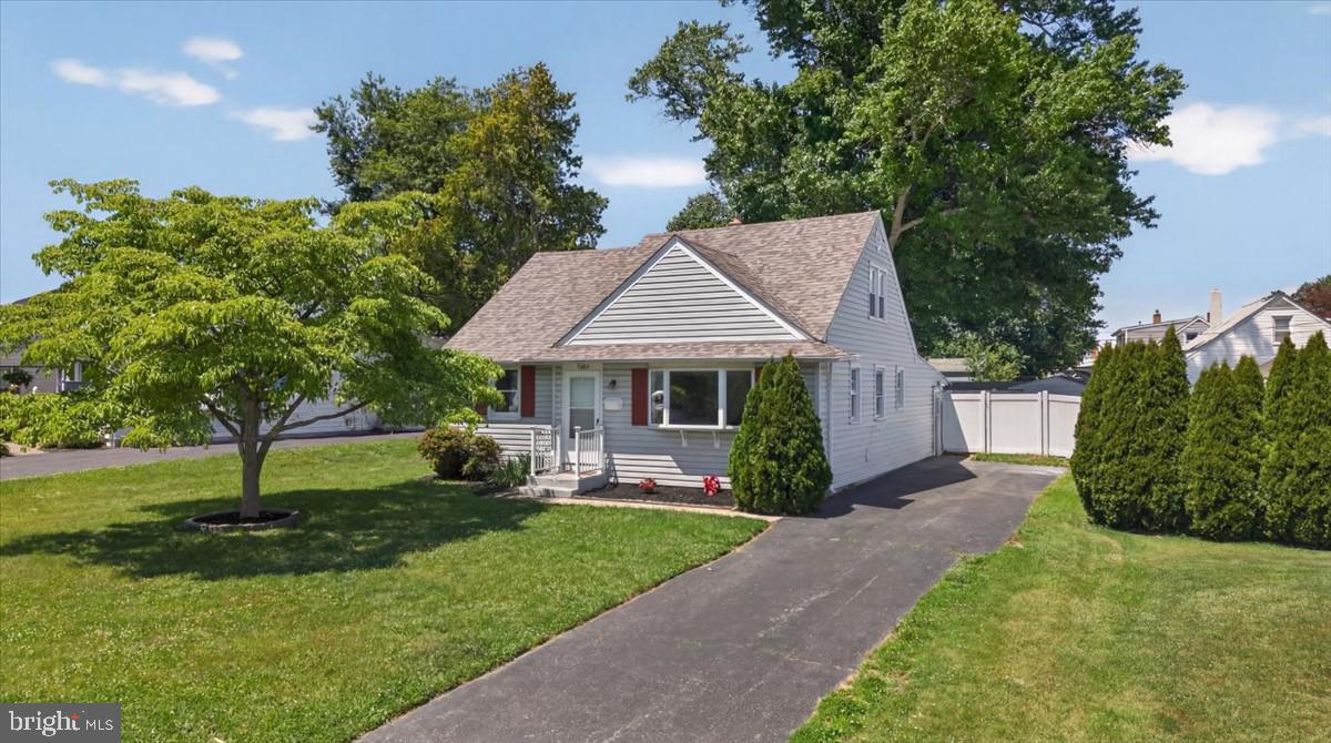 Set on a residential street in the Cherrydale neighborhood, this Cape Cod has been thoroughly updated and is move-in ready. Recent improvements include a completely renovated kitchen and a fully renovated bathroom, fresh paint throughout, and all-new flooring across the home. A new roof, new electrical panel, all-new recessed lighting, and additional outlets added to every room round out the work — meaningful upgrades to both the systems and the everyday livability of the house.
The four-bedroom layout spans two levels, with two bedrooms and the full bath on the main floor and two additional bedrooms upstairs — space that adapts easily to a home office, hobby room, or guest accommodations. The home is served by central air conditioning and natural gas forced-air heating.
The 0.19-acre lot (60 x 129) offers outdoor space for gardening or entertaining, and the driveway accommodates up to four vehicles, with convenient access to nearby shopping, parks, and major commuter routes.
With the major work already completed, this move-in-ready home is ready for its next owner. Schedule your showing today