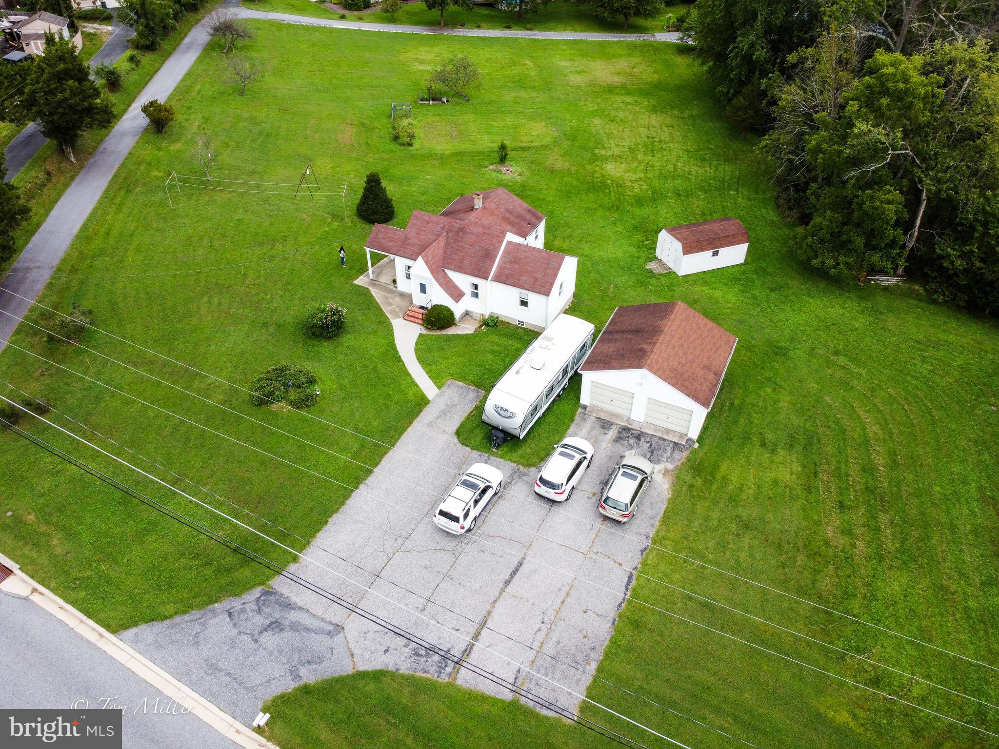 LOOKING FOR ACREAGE?  HERE IT IS!!!  RARE FIND IN PERFECT LOCATION TO BUILD YOUR DREAM HOME(S) !!!  4.32 ACRES., mostly cleared,  with some woods remaining for privacy.   The ZONING IS DR 5.5.   There is a quaint 3-bedroom bungalow situated on the property with hardwood floors throughout that is being sold "AS-IS".   CASH or CONVENTIONAL Financing only.  Renovate the existing home or tear down and build your dream home on this rare property.  Possible Subdivision Potential.  Water and Sewer at the property. Also, a large 2-car detached garage and large parking pad included.   Located only minutes from I-95 and I-695,  shopping, CCBC Campus, and Franklin Square Hospital.   EXCELLENT OPPORTUNITY!  CALL TODAY  for details.
