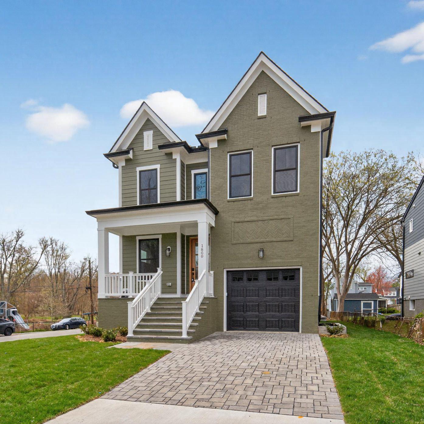 Welcome to this stunning new Craftsman home, expertly built by The Wormald Companies—renowned for over 50 years of excellence in custom home construction and backed by a comprehensive warranty program. Ideally situated just one block from the East Falls Church Metro, mere steps from the W&OD Trail, and directly across from Benjamin Banneker Park, this exceptional residence offers both convenience and natural beauty in a sought-after location. Set on a generous 7,500 sq ft lot, this home features approximately 4,375 sq ft of beautifully finished living space across three expansive levels. The exterior showcases striking Hardie Cedarmill siding and brick in an eye-catching Mountain Sage color palette, complemented by inviting covered front and rear porches, a rear deck, and an attached garage with a rough-in for an electric car charger. Inside, the thoughtfully designed floor plan offers 5 spacious bedrooms and 4.5 bathrooms with premium finishes throughout. Highlights of the main level include: wide-plank hardwood flooring; a private home office; an expansive great room with a gas fireplace; and a spectacular gourmet eat-in kitchen with a large island, creamy quartz countertops and cabinets, and top-of-the-line Bosch stainless steel appliances. The luxurious upper-level primary suite features dual walk-in closets and a spa-inspired bath. Three additional bedrooms finish out the upper level, along with a conveniently located laundry room. The fully-finished lower level is designed for both relaxation and entertainment, offering a spacious rec room with wet bar, a dedicated exercise room (or theater room), and a fifth bedroom with a full bath. Located within the desirable Tuckahoe Elementary, Williamsburg Middle, and Yorktown High School pyramid and offering easy access to I-66, this home is perfectly positioned for modern living. **Finishing touches going in now. Easy to see. Inquire today for further details. Photos are not of subject property. **