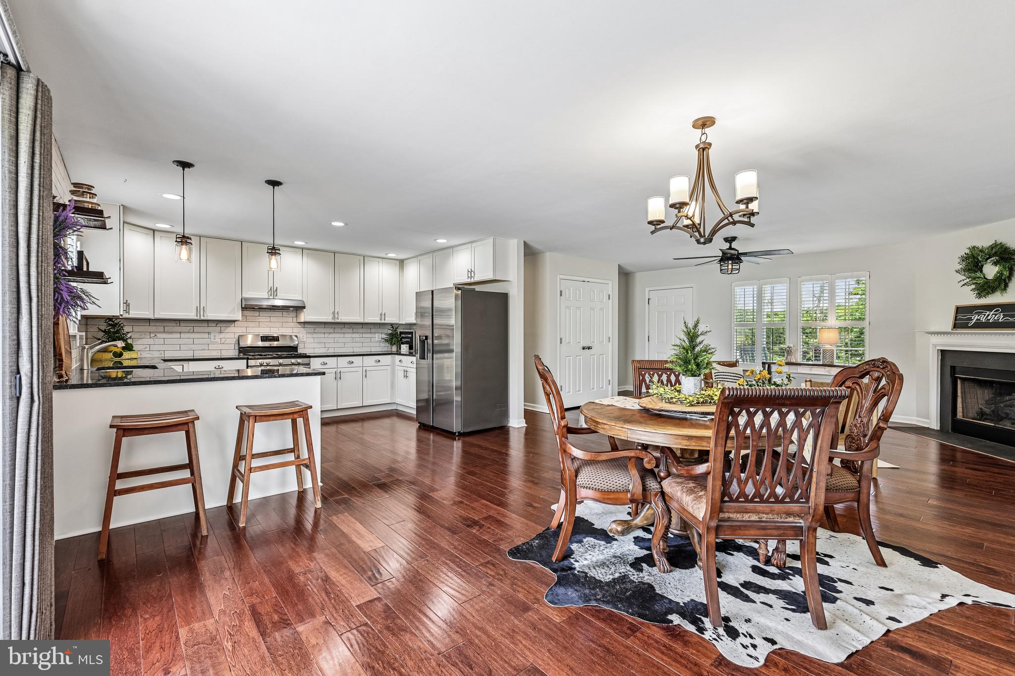 Located in Cedar Run Estates, this exquisite ranch-style home offers a perfect blend of luxury and comfort. Built in 2015, the property boasts an impressive 1-acre corner lot, providing ample space for outdoor enjoyment and privacy. Step inside to discover an inviting open floor plan that seamlessly connects the living, dining, and kitchen areas, ideal for both entertaining and everyday living. The family room, adorned with a cozy corner gas fireplace, creates a warm ambiance for gatherings. The gourmet kitchen features stainless steel appliances, including a gas range and a new refrigerator, complemented by a charming breakfast area. Home completely painted and turn-key ready for your move in! Retreat to the spacious primary suite, complete with a luxurious en-suite bathroom.   Two additional well-appointed bedrooms ensure comfort for all. High-end finishes abound, from engineered wood and ceramic tile flooring to energy-efficient double-pane windows that bathe the interiors in natural light. The home is equipped with a water treatment system, ensuring quality throughout. The basement offers extra storage space, laundry and a walk up basement entrance. Outside, the side-entry garage accommodates two vehicles, while the asphalt driveway provides additional parking for guests. 2 storage sheds for outdoor equipment/storage. Bring your chickens and have fresh eggs!  Enjoy the tranquility of your level lot, perfect for outdoor activities or simply unwinding in nature on your front porch or back patio.  This property is not just a home; it's a lifestyle of elegance and ease, waiting for you to make it your own.  Refrigerator in garage conveys.