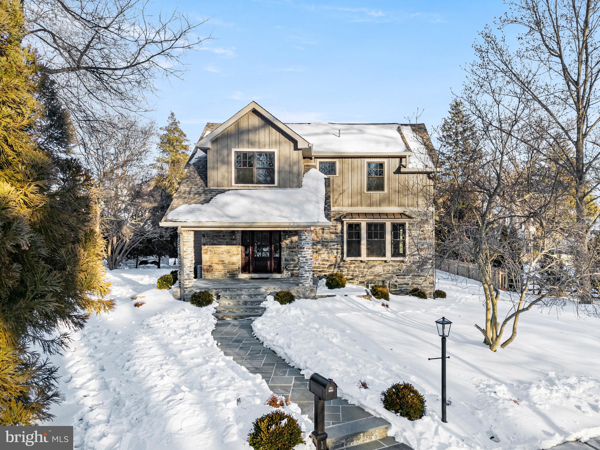 Presenting 16 Narbrook Park, a thoughtfully reimagined and fully renovated single home showcasing exceptional craftsmanship and timeless design, set in the highly desirable Narbrook Park neighborhood with park views. This four-bedroom, three-and-a-half-bath residence has been thoughtfully modernized with high-end finishes throughout, including new white oak hardwood floors, deep windowsills, new Marvin windows, Hudson Valley lighting, inset cabinetry, custom woodworking and carefully restored stonework that beautifully bridges old and new.

 A bluestone front porch sets a gracious tone, opening into a light-filled living room framed by a striking stone opening that leads seamlessly to the open kitchen and family room. Together, these spaces form the heart of the home, anchored by a custom-designed kitchen appointed with quartz countertops and backsplash, a substantial center island with seating, Alder wood inset cabinetry, a Bosch six-burner range and oven, and a custom range hood. An adjacent mudroom - complete with pocket door, walk-in pantry, custom built-ins, and a dramatic powder room with custom woodworking - offers effortless daily functionality with access to the side entrance and detached one-car garage.  

The family room offers a comfortable gathering space, highlighted by a floor-to-ceiling gas fireplace with a hand-sawn hickory mantel, custom woodworking, and sliding doors that open to the side patio. Through an additional stone opening, the dining room is bathed in natural light from two walls of windows, creating an ideal setting for both everyday living and formal entertaining.

Upstairs, the primary suite serves as a private retreat, featuring dual custom-designed walk-in closets and a spa-inspired bath with radiant heated floors, a dual quartz-topped vanity, and an expansive walk-in shower. Three additional generously sized bedrooms - one ensuite - along with a full hall bath, an office/bonus room and a well-appointed second-floor laundry room with walnut countertops complete the second floor.

Set in a highly desirable Narberth location just blocks from the Narberth Train Station, this refined home offers effortless access to City Line Avenue and Lancaster Avenue, as well as the area’s vibrant collection of boutique shopping and dining.