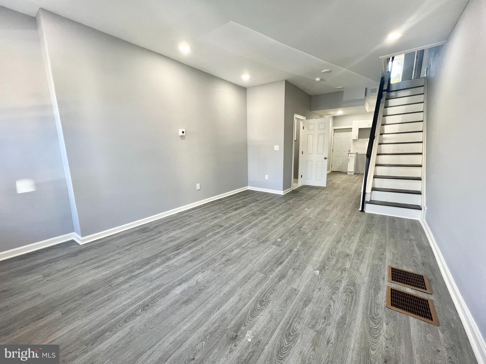 Welcome to 1809 N Taylor St, situated in the heart of North Philadelphia. This freshly renovated home offers three spacious bedrooms and one and a half brand-new bathrooms, complete with stylish subway tile. The kitchen shines with new white shaker cabinets, ample cabinet and counter space, and brand-new stainless steel appliances that were thoughtfully installed prior to move-in. The rooms are filled with natural light, featuring plenty of storage space and large windows. The bedrooms offer ample space, large closets, and generously-sized windows that invite abundant natural light inside. Step into an amazing backyard space, perfect for enjoying sunny days. Don't miss the opportunity to be the first to call this beautifully refinished home your own in North Philadelphia.