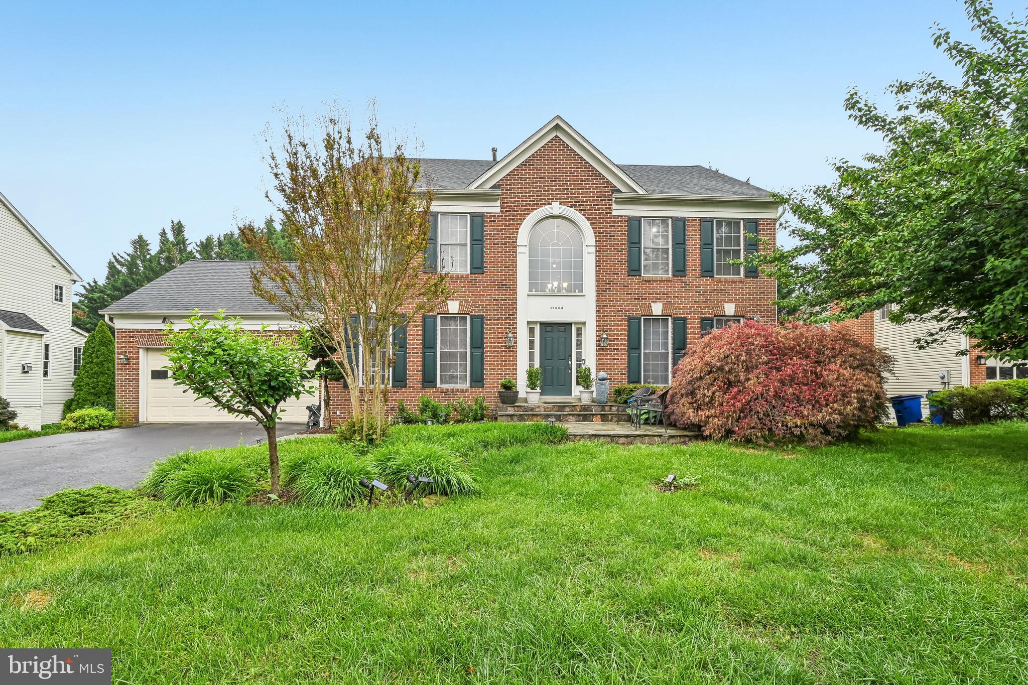 Welcome to this spacious brick-front Colonial located in a sought-after community, offering a blend of style, comfort, and functionality. Step inside to find impressive 9-foot ceilings and a thoughtfully designed layout featuring a formal dining room and a versatile office or sitting area. The open-concept kitchen serves as the centerpiece of the home, complete with high-end appliances, granite countertops, a large island with seating, and additional space for casual dining.
The kitchen flows seamlessly into the inviting living area, highlighted by a wood-burning fireplace, custom built-ins, and plantation shutters. A convenient half bath completes the main level.
Upstairs, the spacious primary suite features a walk-in closet and an en-suite bath with a separate tub and shower. Three additional generously sized bedrooms and a full hall bathroom provide flexible living space.
The finished basement offers additional living and entertaining space, including a half bath, laundry room with abundant storage, and a large recreation area. An additional bedroom and sliding door access to the deck add versatility to the lower level.
Outside, enjoy a private backyard surrounded by mature trees, complete with a spacious deck and a gazebo equipped with electricity. A two-car garage provides added convenience and storage.
Community amenities included in the HOA feature a pool, playgrounds, walking and jogging paths, basketball courts, and additional recreational areas. Conveniently located near shopping, dining, parks, and commuter routes.