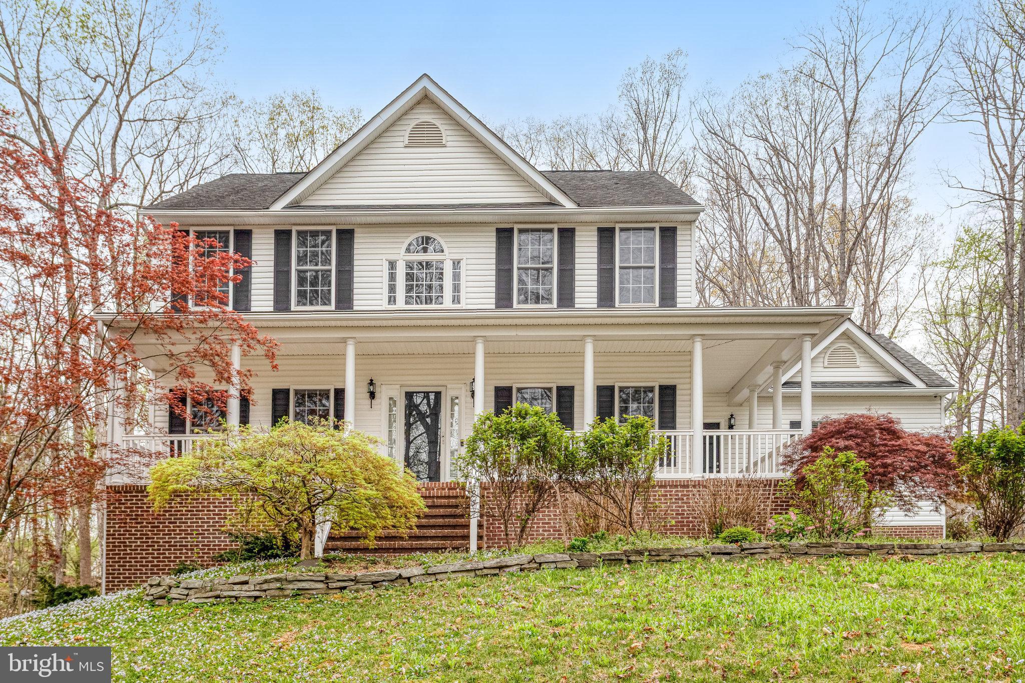 ******Apply Using RentSpree*****
Stunning Colonial with Upgrades & Unique Features. Nestled in a serene, wooded setting, this gorgeous Colonial offers comfort and modern upgrades. The upper level features three spacious bedrooms, two full baths, and the convenience of an upstairs washer and dryer. The finished basement includes a wet bar, a large rec room for your enjoyment, as well as a full bath and ample storage area.  Home is equipped with a whole-house generator for peace of mind. A handicap-accessible ramp at the back of the house leads to a main-floor in-law suite with its handicap-accessible bathroom, offering flexibility and convenience. Step outside to a beautifully designed fire pit area. The home is also equipped with LeafGuard seamless gutters for easy maintenance. Plus, a spacious 16' x 24' two-story storage shed with electricity provides ample storage or workspace. Conveniently located just a short drive from I-95 and the VRE, this home offers the perfect blend of privacy and accessibility. Don’t miss out on this one-of-a-kind property with incredible extras! New wood floors on the second level in November 2023, and new quartz countertops and cabinets installed in April 2025. Marble Floor in powder bathroom, Nov. 2023, new flooring in guest bathroom in Nov. 2023. New wet bar in Nov. 2023. Brand New wine fridge in April 2025. The washer/dryer is from 2022