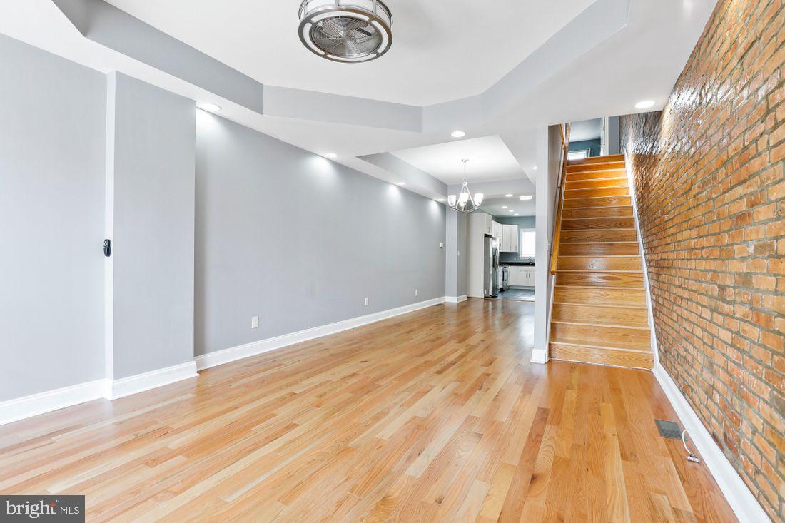 Don't miss out on this beautiful recently renovated 3 bed 3 bath home with PARKING. Exposed brick through out, stainless steel appliances with granite countertops. Fully finished basement. This home has it all. Schedule your showing today.