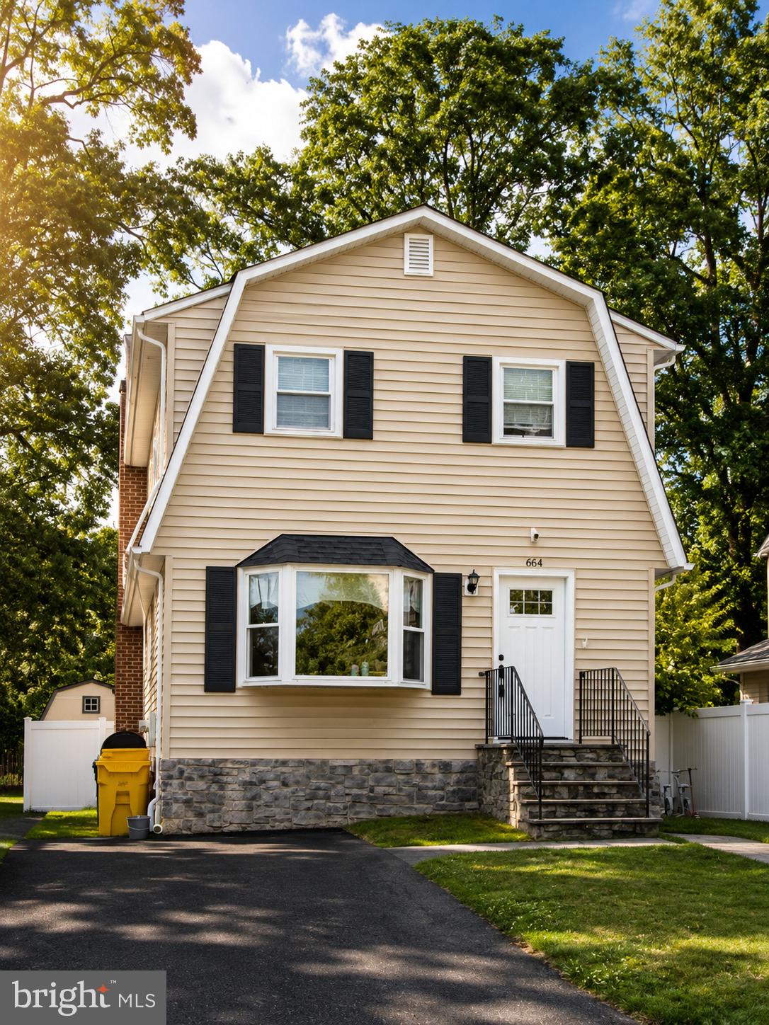 Beautiful, well-maintained Colonial featuring a striking stone front and numerous updates throughout. The remodeled kitchen is the heart of the home, showcasing premium appliances, abundant cabinetry, and a layout ideal for both everyday living and entertaining. The spacious living room is highlighted by a stunning floor-to-ceiling brick fireplace with raised hearth, creating a warm and inviting focal point.
Rich Brazilian flooring flows throughout the main level, adding warmth and character. Outside, enjoy a fully fenced backyard with maintenance-free vinyl fencing, a large storage shed, and ample off[street parking for three vehicles.
The finished walk-out basement significantly expands the living space and offers endless possibilities, featuring a large recreation room plus a separate den that can serve as a guest room, home office, gym, or potential 4th bedroom. 
direct walk-out access provides convenience and flexibility rarely found in comparable homes.
Conveniently located and move-in ready, this home offers the perfect combination of charm, functionality, and additional living space.
