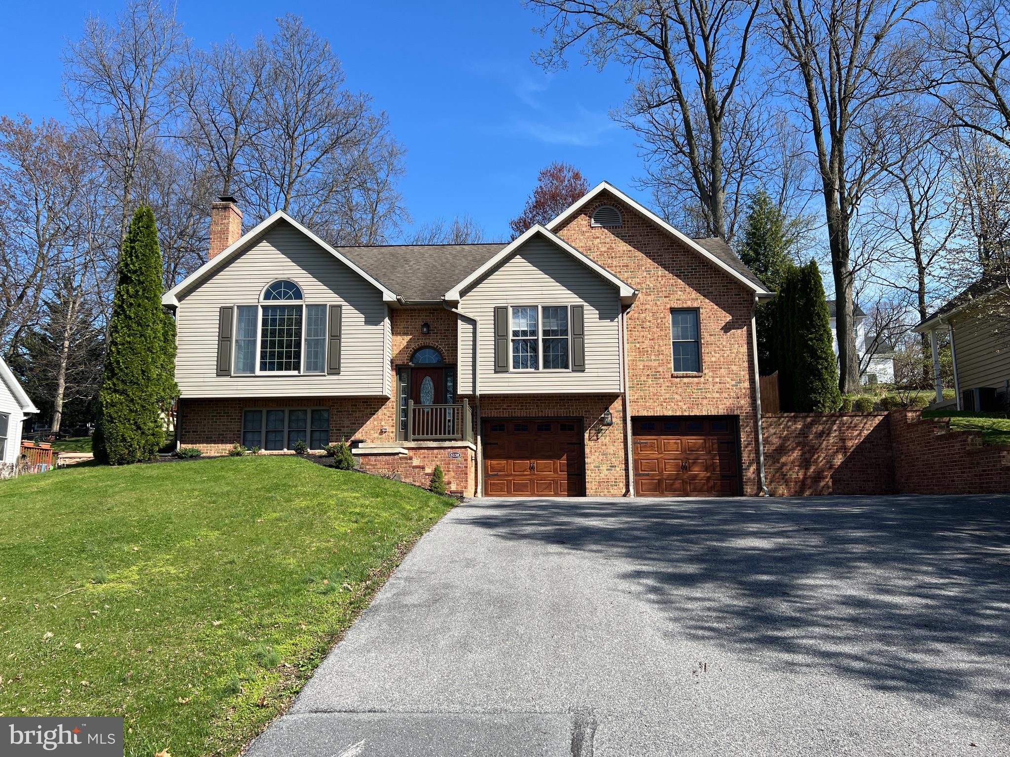 Beautifully updated split level home in the Penn National golf course community.  Current owners remodeled both bathrooms to include a walk in shower in the primary, new vanities in both, LVP flooring in the kitchen, dining area, laundry, and master bath, new heat pump/AC in ‘23, all appliances replaced in ‘22, fenced backyard in ‘21, window coverings custom fitted fabric cordless blinds in living room and 2 bedrooms, home was painted after purchase in ‘21. Main floor laundry room, sunroom and patio on the rear.  Wood burning fireplace in the living room.