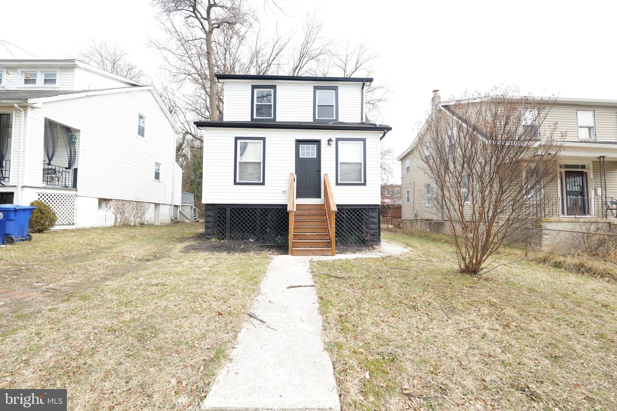 Welcome to 4905 Midwood Ave, a beautifully renovated single‑family detached home offering 3 bedrooms and 1.5 bathrooms. This home features a bright open‑concept main level with a spacious living room and a stunning kitchen complete with white granite countertops, gold accents, and brand‑new appliances. The upper level includes three comfortable bedrooms and a lovely tiled full bathroom. An additional half bathroom on the main level provides convenience for guests. The large finished basement offers flexible space for a family room, play area, home office, or gym. A sliding glass door leads to a spacious deck overlooking a generous backyard—perfect for gatherings, barbecues, and outdoor entertaining.

This move‑in‑ready home blends modern updates with functional living spaces, making it an excellent opportunity for any buyer.