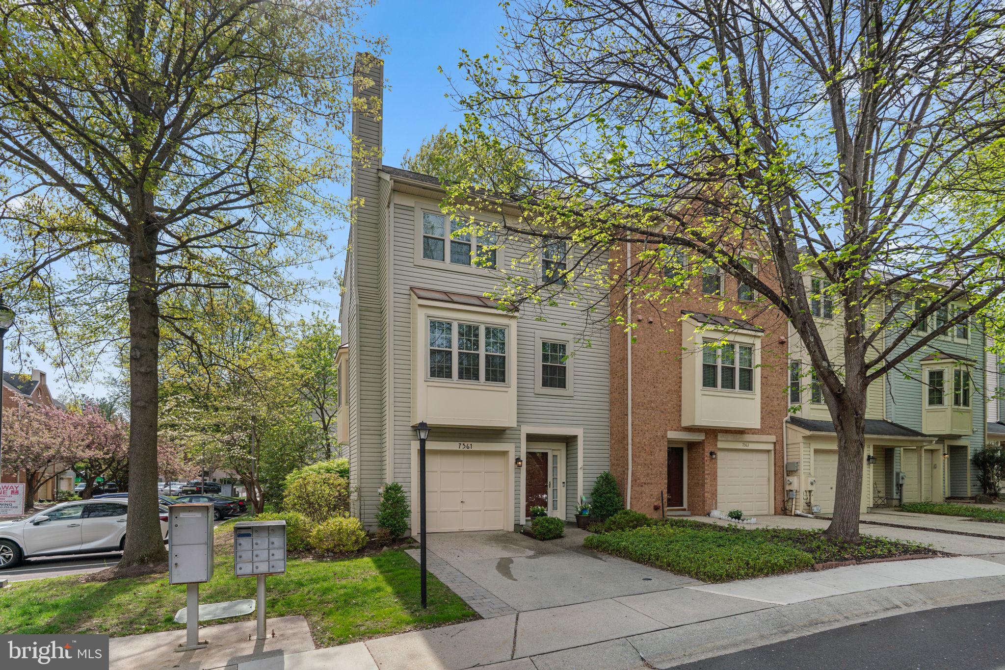 Must see garage, end unit town home in sought after Kings Contrivance, Columbia! Endless improvements and a sun filled open floorplan featuring: new roof (2019); replaced Carrier HVAC (2011);  replacement windows; gorgeous hardwood floors throughout the lower and main levels; expansive eat-in kitchen w/upgraded counters, 42" cabinets, stainless steel appliances, and a slider leading to the oversized deck; family room w/warm wood burning fireplace; open dining room w/bright bay window bump-out; main level powder room w/pedestal sink; upper level w/3 bedrooms, 2 updated full bathrooms and soaring vaulted ceilings throughout; spacious walk-in closet in primary bedroom; primary bathroom w/oversized soaking tub and updated granite vanity; 2nd full bathroom w/updated granite vessel sink; fully finished lower level w/welcoming foyer, oversized rec room, laundry room, utility room and walk-out w/new sliding glass door (2024) to fenced in rear yard. Ample parking. Community fee includes lawn mowing and community landscaping. Walking distance to parks, school, and the Kings Contrivance shopping center, which features a Harris Teeter, restaurants, a bank, a gas station, cleaners and more. Minutes from major commuter routes, Columbia Mall, Merriweather, Baltimore, DC, Ft. Meade and BWI Airport. You can't beat this location.