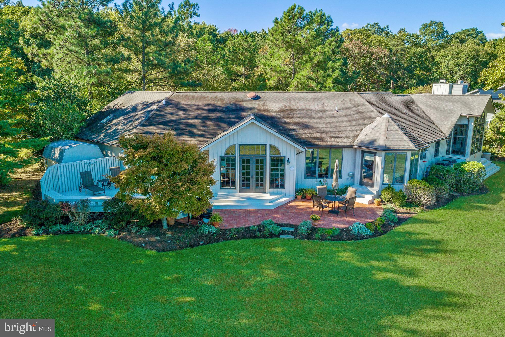 Wonderful waterfront home on one level with terrific floor plan. Stunning family room with vaulted ceilings, stone fireplace. Updates throughout including new quartz counters & stainless appliances in the eat-in kitchen. Sep dining room. Wood floors. Beautiful water views. Lovely landscaping. Deck, patio & private pier. Two-car garage. Community beach, park and marina. Thomas Point Park nearby.