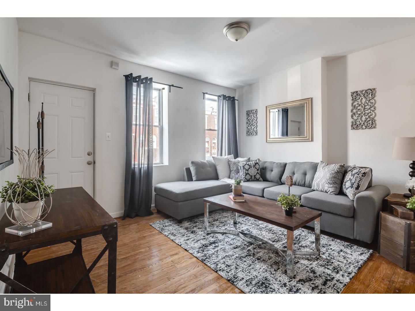 Welcome home to 2545 Sepviva st! This lovingly maintained 2 bed, 1 bath Fishtown row is situated on a great block and features central air/heat as well as refinished original hardwood floors throughout.  The first floor is comprised of the natural light filled large formal living and dining rooms along with the spacious kitchen that has been updated with stainless steel appliances, custom wood cabinetry, and ceramic tile. The rear patio is perfect for summer BBQs, entertaining and/or pets and can be accessed from the dining room. Upstairs you will find a very large full bath and two very spacious bedrooms with ample closet space. The full unfinished basement contains the washer & dryer, mechanicals, and has plenty of space for storage. Located just a couple short blocks from great neighborhood staples like Memphis Taproom, Cook & Shaker, as well as being convenient to grocery stores, public transportation and major roadways. Come see this charming home for yourself today!