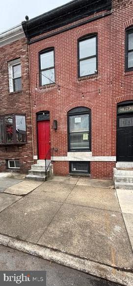 Prime block  of Baltimore homes located on S Clinton St.!  Many renovations have been performed over the past years. This home features high ceilings and an open stairwell. The living room has recessed lighting, bright windows, abundant natural light, custom baulk heads, and an exposed brick wall that has been nicely preserved.  There is an eat-in kitchen with stainless steel appliances, granite counter tops, large cabinets, and a center island. Back kitchen door walks out to your 1 car off street all concrete parking pad. There is a main level powder room. On the upper level is the primary and secondary bedroom equipped with recessed lighting, closets, and individual private bathrooms. One bedroom has a walk out back deck for evening relaxation and entertaining.  On the lower level is a fully finished family room or bedroom, an area ideal for additional storage and a full bathroom. Main level does need a small amount of drywall repairs and ready to have flooring installed. A very short walk to Patterson park and all the surrounding restaurants.