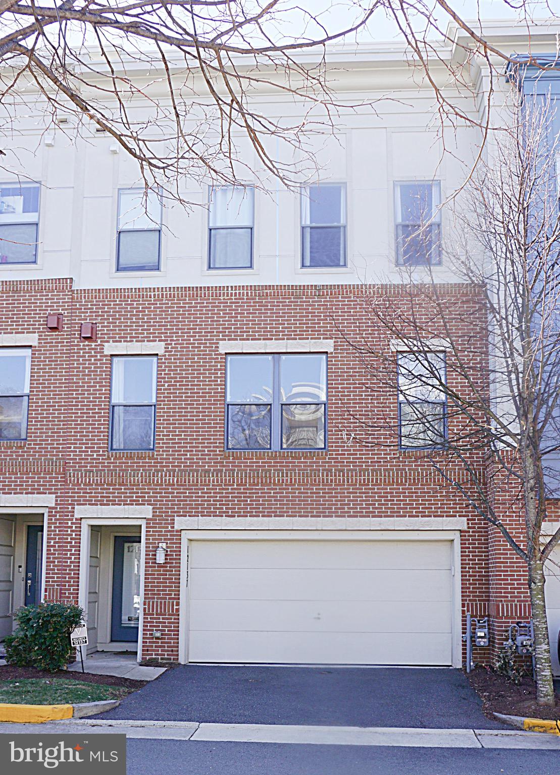 Modem townhouse offers a blend of luxury and convienence within a high-demanded community in the center of Fairfax.  Contemporary style with 4-level, 3 bedrooms, 3 full/2 half bathrooms plus a 2-car garage with 2-car driveway parking.   Main level with open concept throughout the floor, Goumet Kitchen with large island, granite countertop, brandname appliances, SS appliances,  Dining & Living area plus a spacey Deck.  Fully open top level as an entertaining center, studio or office, plus a rooftop terrace, in addition of  bedroom and a full bathroom.  Master suite, one bedroom, a full bath and laundry complete the 3rd floor.  The fourth room located in the entry-level with a half bath, an ideal office or study.  Walking distance to shopping center & mall.  Near major highway entrance.