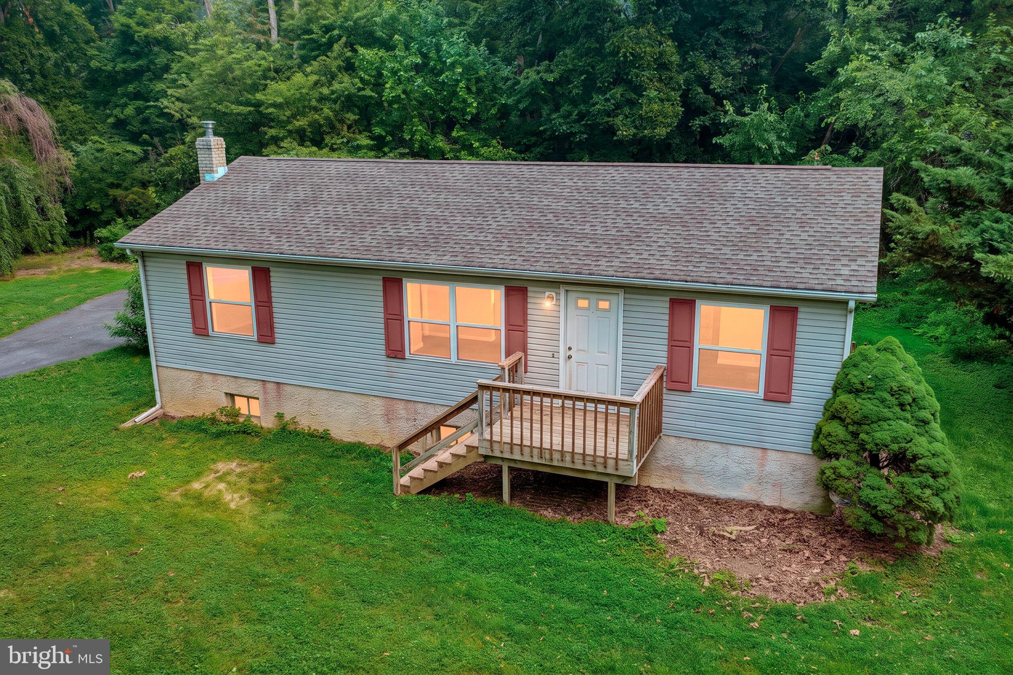 Escape to the perfect blend of comfort in this charming 3-bedroom, 2-bath ranch situated on over half an acre in a desirable northern Middletown location.  Tucked just outside the town limits, this property offers the privacy you’ve been looking for with no HOA and no community deed restrictions.  Inside, you’ll find a warm and inviting floor plan featuring a cozy living room that flows seamlessly into the dining room—ideal for everyday living and entertaining.  A sliding glass door leads from the dining area to an oversized deck overlooking the backyard, complete with a built-in fire pit that’s perfect for relaxing evenings with family and friends.  A functional Kitchen with a pantry offers extra counter space for meal prep. The full basement offers endless possibilities, featuring egress access for future finished living space, a cozy wood-burning stove, and a separate workshop area for hobbies, projects, or extra storage.  Need room for vehicles, equipment, or your dream workshop?  The impressive detached garage, approximately 24’ x 48’, provides exceptional space for cars, boats, recreational vehicles, or a home business, while an additional storage shed offers even more flexibility.  Enjoy country-style living with the convenience of nearby shopping, dining, schools, and major commuter routes. Opportunities like this—with acreage, an oversized garage, and the freedom of no HOA—are hard to find. Don’t miss your chance to make this exceptional property your own.  Freshly painted and new LVP flooring throughout for move in ready condition.