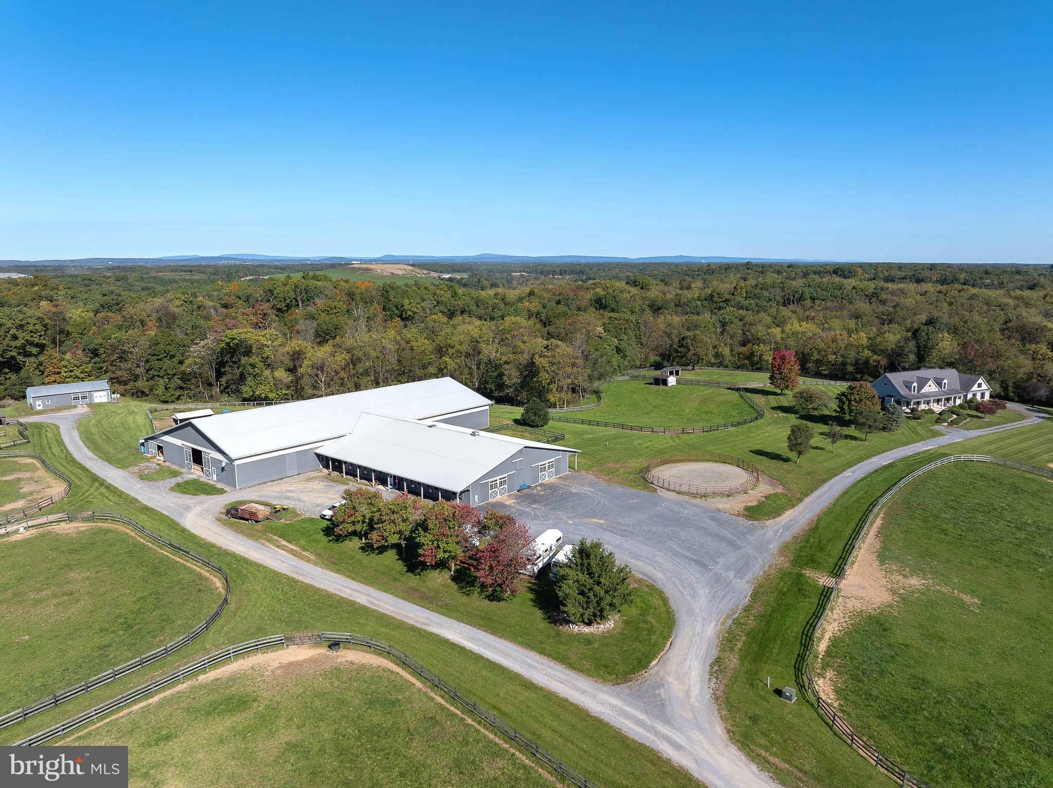 Breathtaking Equestrian Farm in Clarke County! Welcome to an exceptional opportunity to own 90+ acres of pristine and magnificent farmland in Boyce, VA! This property is a horse enthusiast’s dream that features a beautifully maintained barn with 25 horse stalls and 3 wash stalls. One of the 25 stalls is a rare USDA approved quarantine stall. Conveniently connected to the barn is an amazing 180’ x 80’ indoor riding arena. The farm also boasts a 200’ x 250’ outdoor riding arena, 15 paddocks and numerous riding trails. But it doesn’t stop there as the property also features a well-maintained single-family home with 3 bedrooms, 3.5 bathrooms, gas fireplace, 2 car garage and covered porches. Call us to schedule a visit!