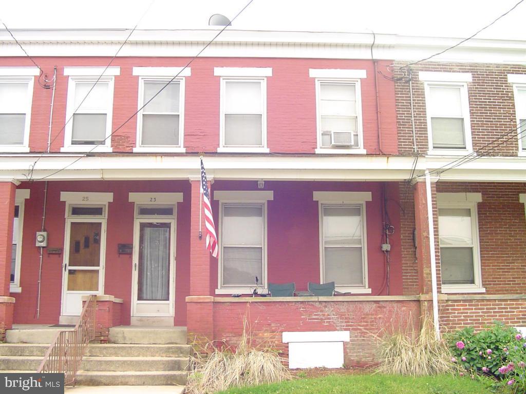 Warm row home on great street. This could be your next home or your next investment property. Currently occupied by an excellent tenant. Home boasts hardwood floors, formal dining room, good size kitchen and large living room. Large back yard, potential off street parking/garage. Priced ''as is'' to sell. Bring your buyers!