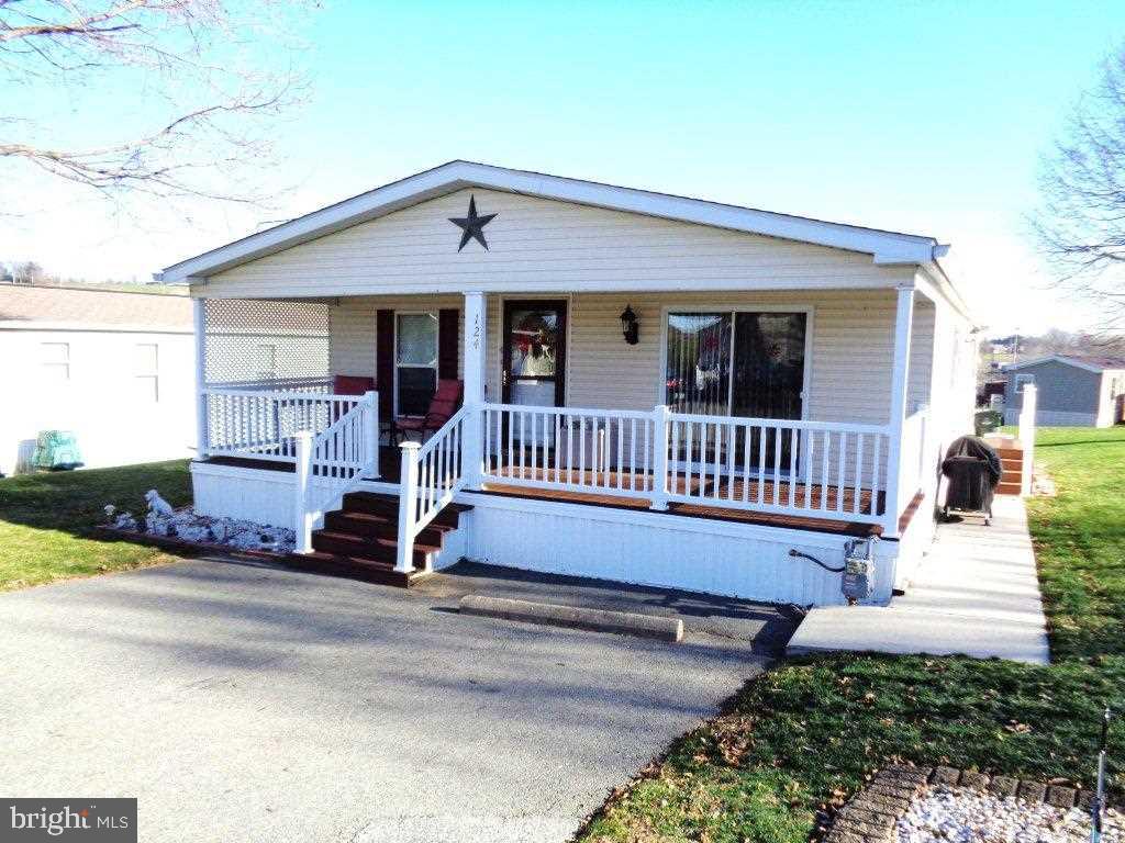 55+ community, convenient location, 1st flr living, home w/ 8x28 covered porch, open flr plan, sliding glass door from dining area to porch, breakfast bar, MSTR suite w/ WIC & large MBA, large KIT w/ ample cabinets, shed. 2006 Pine Grove Model #G1780.