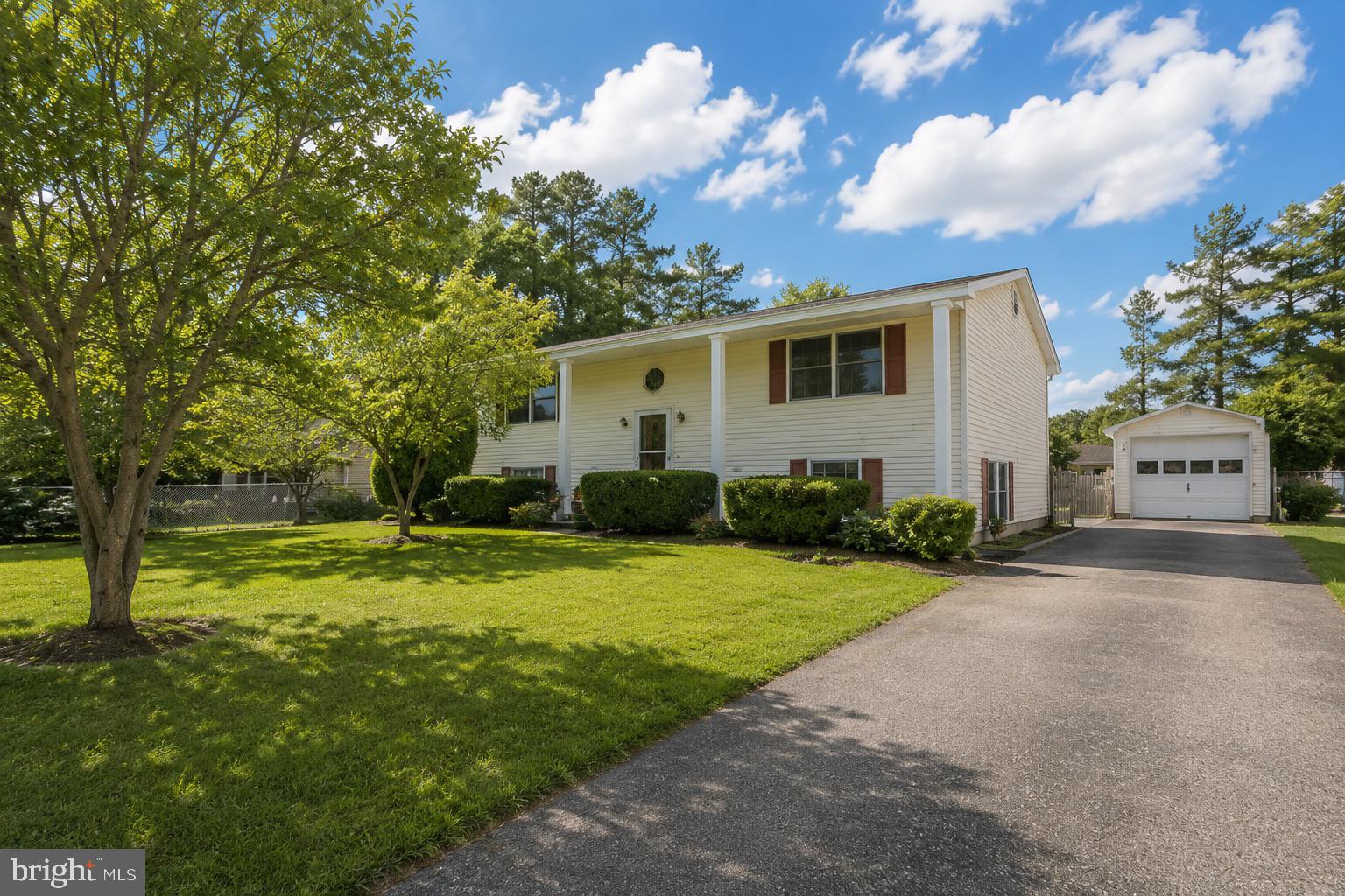 Welcome to 602 Evans Drive, a spacious 4-bedroom, 2-bath split-level home set on a 0.34-acre lot in Milford’s Eastman Heights community. Offering 1,588 finished square feet, this home provides a practical and flexible layout with two bedrooms and a full bath on the main level, plus two additional bedrooms and a full bath on the lower level. Interior features include central A/C, electric heat, tankless electric hot water, and a full finished lower level, while the exterior offers a screened porch, personal above ground pool, asphalt driveway, and plenty of outdoor space to enjoy. The location adds strong convenience, with Downtown Milford, the Mispillion Riverwalk, Bayhealth Hospital Sussex Campus, Routes 1 and 113, shopping, dining, and everyday amenities all within easy reach.
