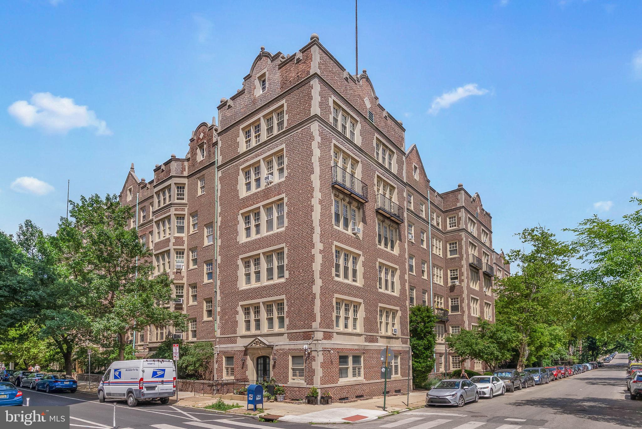 Rarely does a condominium offer the space, character, and presence of a single-family home, but Residence B210 at Garden Court does exactly that. Spanning over 1,800 square feet, this expansive three-bedroom, two-and-a-half-bath home combines timeless architectural details with thoughtful modern updates in the heart of University City.

Beyond the welcoming foyer, generous living and entertaining spaces unfold with abundant natural light and oversized windows throughout. The updated kitchen blends style and function with granite countertops, custom cabinetry, premium appliances, and smart storage solutions. A private balcony provides a convenient outdoor escape.

The home's flexible layout offers spacious bedrooms, updated baths, in-unit laundry, and an impressive amount of closet space rarely found in city living. Historic details such as hardwood floors, decorative fireplaces, bay windows, leaded glass accents, and classic tilework reflect the building's rich architectural heritage.

Garden Court remains one of West Philadelphia's most beloved residential communities, offering residents access to an indoor swimming pool, fitness center, library, bike storage, meeting space, and beautifully landscaped private courtyards with fountains and koi ponds.

Perfectly positioned near Penn, Drexel, neighborhood restaurants, coffee shops, parks, and public transportation, this residence offers the convenience of condominium living without sacrificing the comfort and scale of a traditional home.