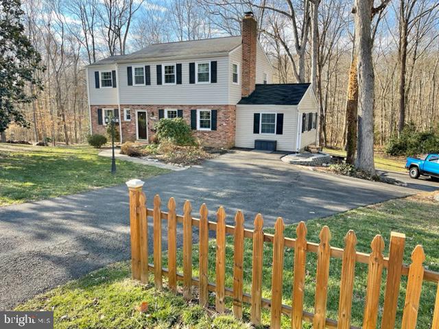 Coming soon with renovations completing this next week! For sale is this beautifully updated 5 bedroom, 3.5 bathroom Colonial on arguably the best 1.3+ acre quiet & wooded corner lot in Springfield/Fairfax County. The home includes a Remodeled Kitchen & all 4 Remodeled Bathrooms, Hardwood Floors, Finished Daylight stepout Basement, 2 Fireplaces, Deck, Flagstone Patio w/Firepit, Large Storage Shed, Garden area, Huge Secluded Yard, New Thermal Windows, Crown Molding, & NO HOA. There is an owner's en-suite upstairs with the initial 4 bedrooms, & then a guest en suite downstairs in the step-out basement. The basement is currently getting new Luxury Vinyl Plank flooring installed and fresh paint throughout the home. The home is on a double lot that backs up to 800+ acres of Wooded Parkland, with direct access to miles of established trails, Lake Accotink Park, a fishing creek, & is part of the Fairfax County Deer Management area. There is a Pentagon Express Bus stop within about a mile that is the last stop before the Pentagon, providing a convenient 15-18 min ride downtown. This is a unique home based on the location that allows for a secluded woods feel, with access to everything DC has to offer still within minutes. Pride of ownership is throughout the home as it was purchased from the original owners who built it in 1963 (all of the plumbing, electrical, & high efficiency HVAC were updated in 2019-2025). The neighborhood the best you can find, with neighborhood planned events on most holidays, & neighbors who care. Neighborhood Pool Membership is also available with an active swim club. An added plus is all appliances are included in the sale: kitchen refrigerator, oven/stove, microwave, dishwasher, washer/dryer, and basement fridge. Come check out this secluded but convenently located gem today!