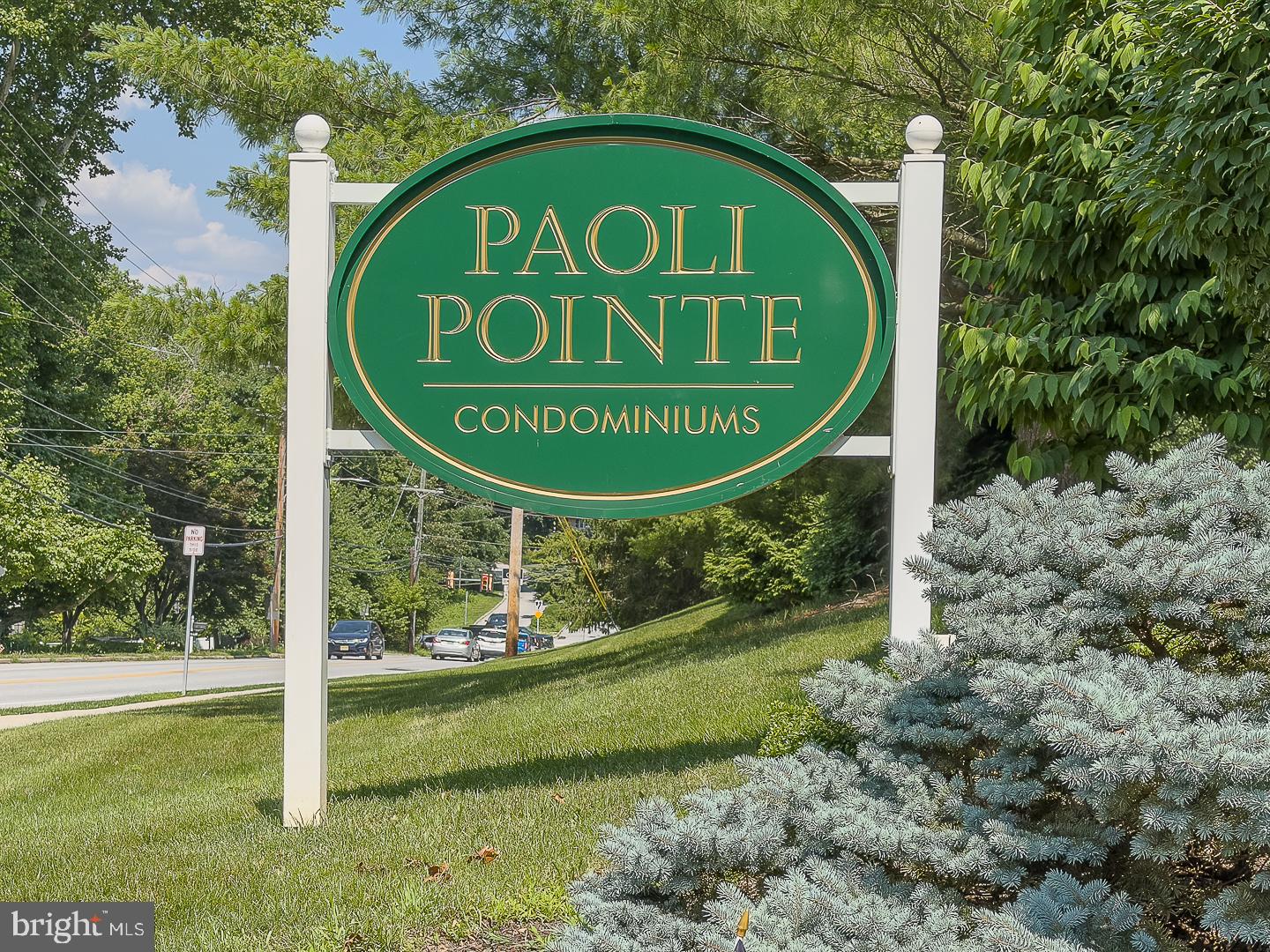 Welcome to Paoli Pointe, a popular 55+ Main Line community..  This location is centrallly located, close  to the Paoli train station, shopping, dining, KOP , Valley Forge, major highways and much more! Enter the well appointed main building lobby and take the elevator to the second floor and your new home.
This condo is a corner unit offering natural lighting, fresh air and pooliside views from the spacious covered balcony.  There is also a storage closet that makes storing your outdoor furniture very easy on the balcony.  Enter this condo into a spacuous hallway flowing into large living area with corner gas fireplcace, oversized sliders to the covered balcony, dining area and kitchen with traditional cherry cabinetry.  The washer/dryer is conveniently located adjacent to the kitchen. in a large closet/pantry area.
Returning to the entrance hall , there is an oversized coat closet and huge linen closet.  The hallway continues to the first bedroom and hall bath. The hall bath has a tiled stall shower, vanity and medicine cabinet. Then you enter the spacious primary bedroom with oversized closet and view overlooking the pool.  The primary bath is en suite with tub/shower, cherry vanity and medicine cabinet.
This unit aslo has large storage area on the main floor to store hoiday decorations, luggage, etc. 
Paoli Pointe is a wonder ful community with pool and and many ammenities including oversized kitchen, cardroom, billiards room,meeting room  small exercize room and library.  This is the perfect location for low-maintenance ,carefree living.