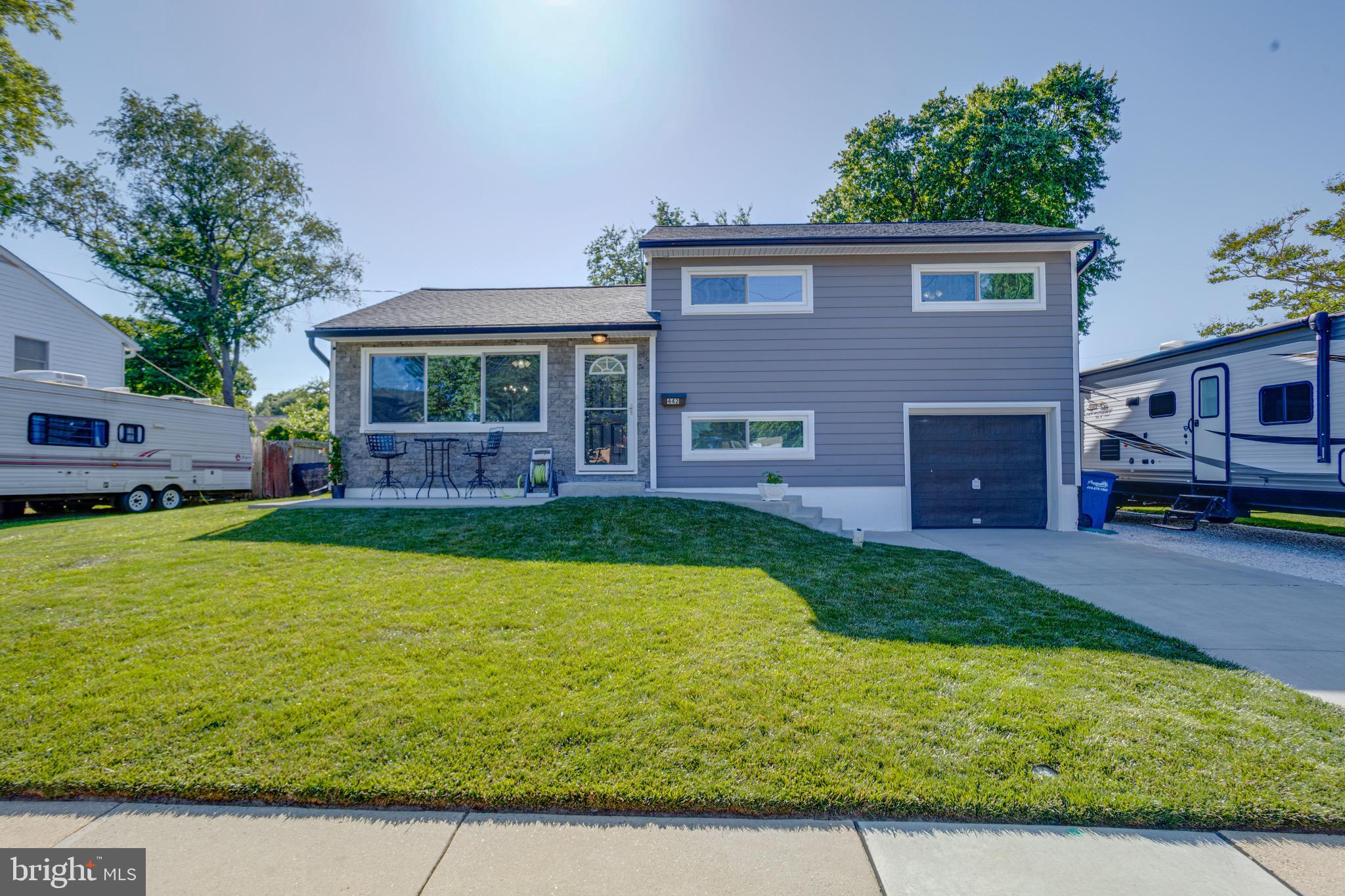 Welcome to this beautifully maintained 4 bed, 2 full bath single family home with a one car garage in the Aberdeen Hills neighborhood.  This home sits just seconds from tons of dining and shopping destinations and just minutes from Rt 40, I-95 and APG.  Pull into the driveway or park in the one car garage.  Entering through the front door brings you into the main level with lvp flooring throughout the front living room.  This spacious living room area has vaulted ceilings and opens up directly into a formal dining room.  Off of the dining room is the kitchen which has tile flooring, a deep farmhouse sink, a backsplash, plenty of cabinetry and all black matching appliances.  To the left of the kitchen is a main floor owners suite addition.  This bedroom is carpeted, and has its own walk in closet and private bath with a walk in shower.  Back off of the living room, a short flight of stairs brings you to the second level.  This carpeted level consists of 3 bedrooms and a full bath with a tub/shower combo.  Back off of the living room, another short flight of stairs brings you to the lower level.  Down here you'll find a 5th bedroom, and a storage room with laundry facilities and a wash sink.  A rear door off of this level leads out onto a covered rear patio and into the fully fenced private rear yard.  This large yard is cleared and grassy and comes with a storage shed for all of your outdoor needs.  This house has been well taken care of and maintained with new windows, siding and roof all done in 2024.  It truly is a gem, and is not one that you want to miss seeing!