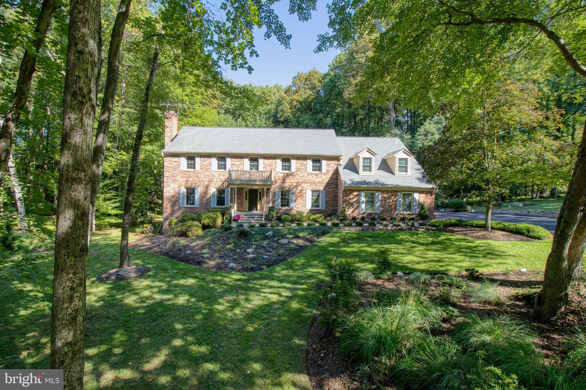 Open house Sunday March 24th 2-4pm. Perfectly placed in a private park-like setting this elegant, all brick and well-maintained colonial has everything you are looking for in the sought-after neighborhood of Richland Meadows. The property features a serene backyard oasis with pool and surrounded by mature trees for peaceful privacy on just over 2 acres.  The residence offers 5 bedrooms and 5 bathrooms with over 6000 sq ft of living space. Main level features generously sized rooms with soaring 9-foot ceilings.  gleaming hardwood floors, dentil molding throughout the main level, family room with wood fireplace, large kitchen with casual dining area and bright and light sunroom providing bucolic vistas of the backyard. The upper level provides an impressive owner’s suite with 2 walk -in closets, dressing room with large vanity and spacious bathroom, an ensuite bedroom and 2 additional bedrooms with shared hallway bathroom. The walk-out lower level is fully finished with ample space for a club lounge or billiards/ game area, with a lovely guest bedroom and full bath. Welcome to your new home.